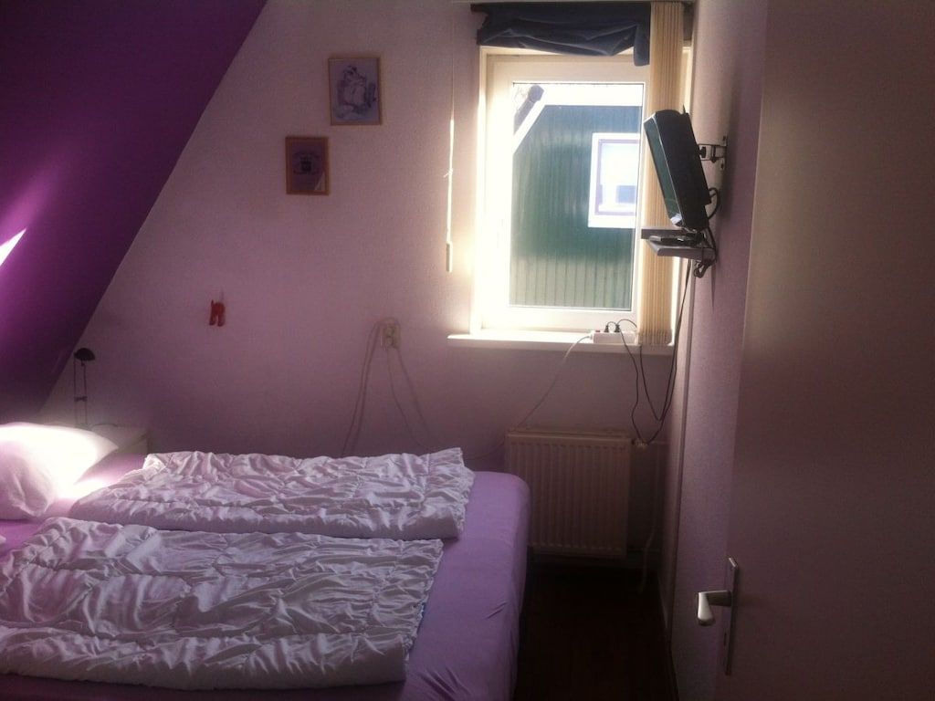 Een slaapkamer van 120299 in Sint Maartenzee