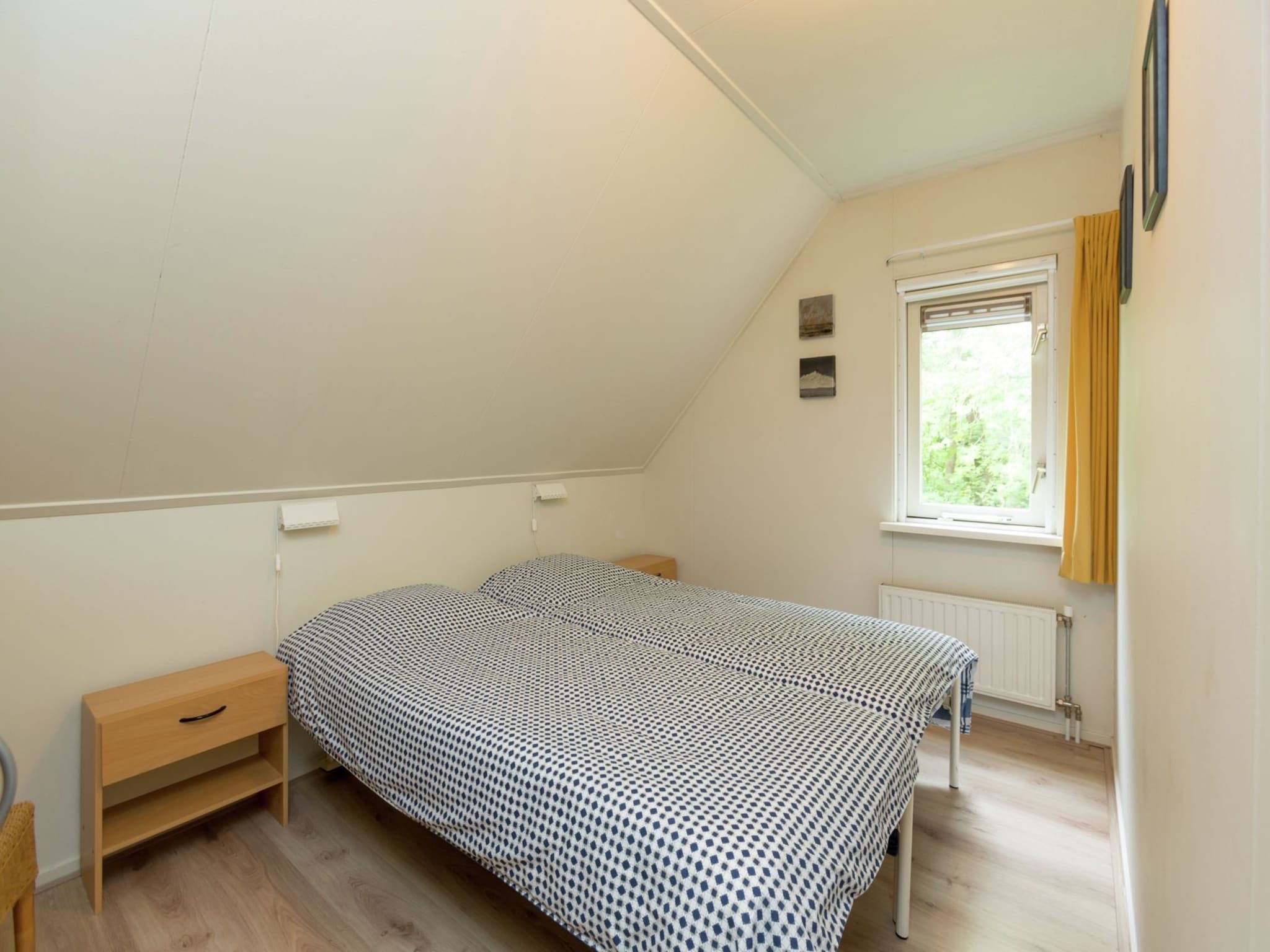 Een slaapkamer van Buitenplaats Berg en Bos nummer 43 in Overijssel