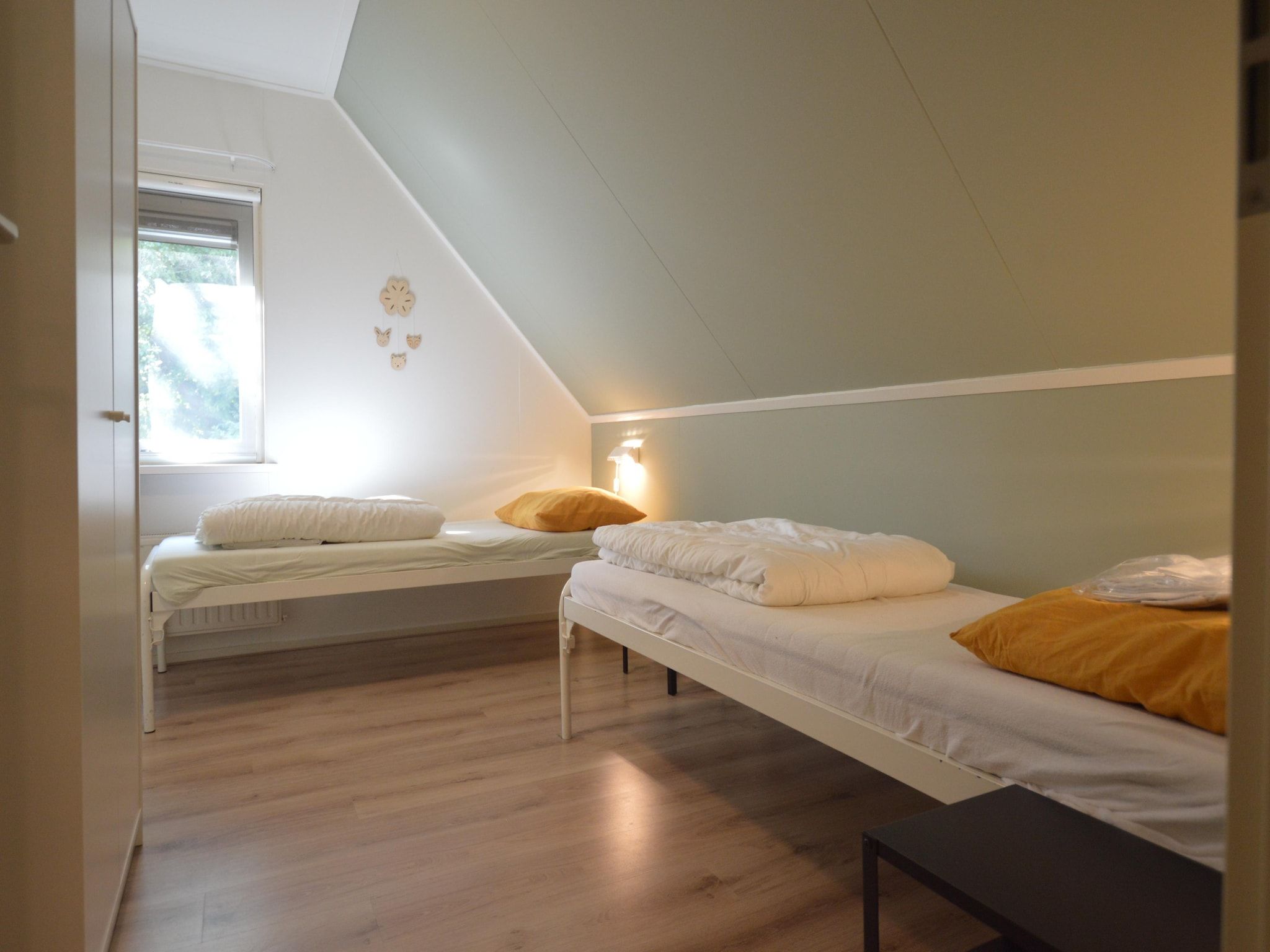 Een slaapkamer van Buitenplaats Berg en Bos nummer 43 in Overijssel