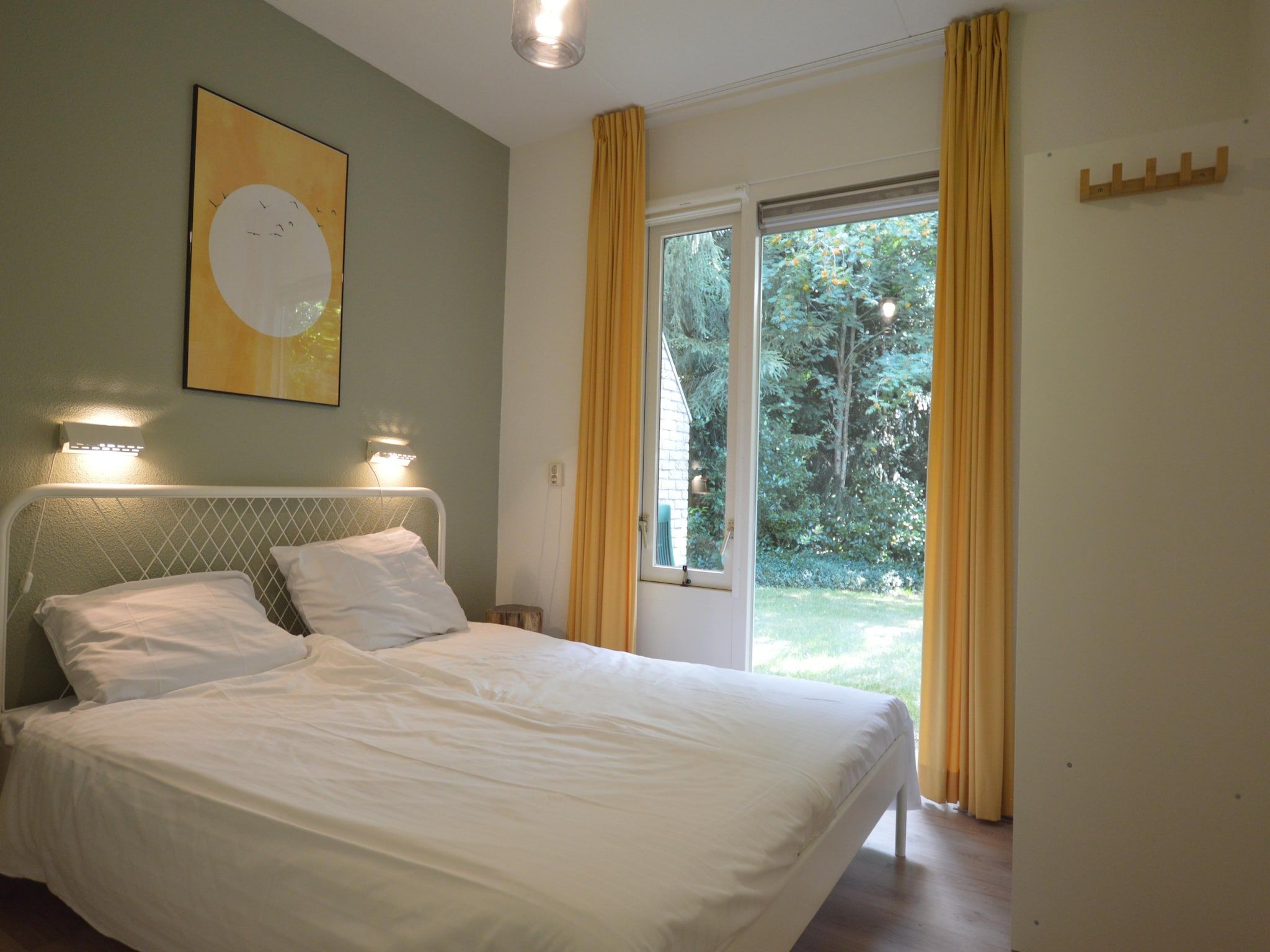 Een slaapkamer van Buitenplaats Berg en Bos nummer 43 in Overijssel