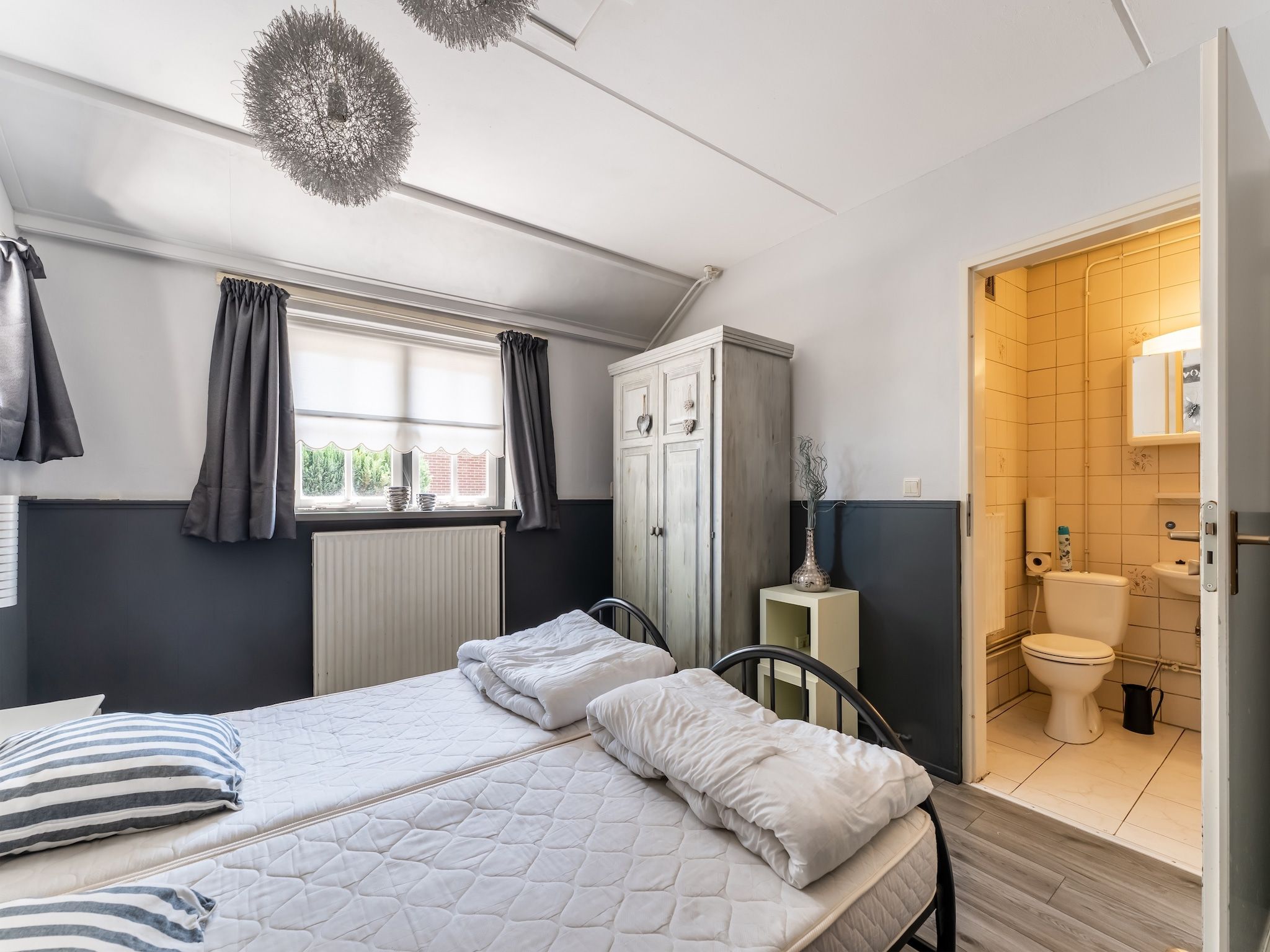 Een slaapkamer van Hoeve Ginette in Giethoorn