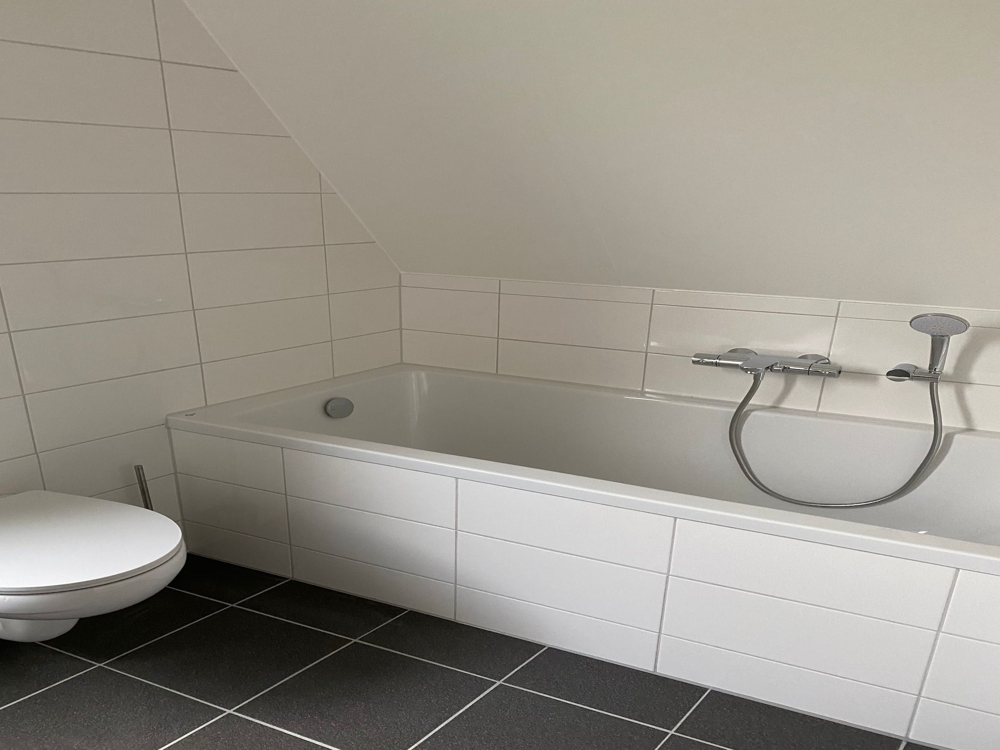 De badkamer van Vakantiepark de Katjeskelder 21 in Oosterhout