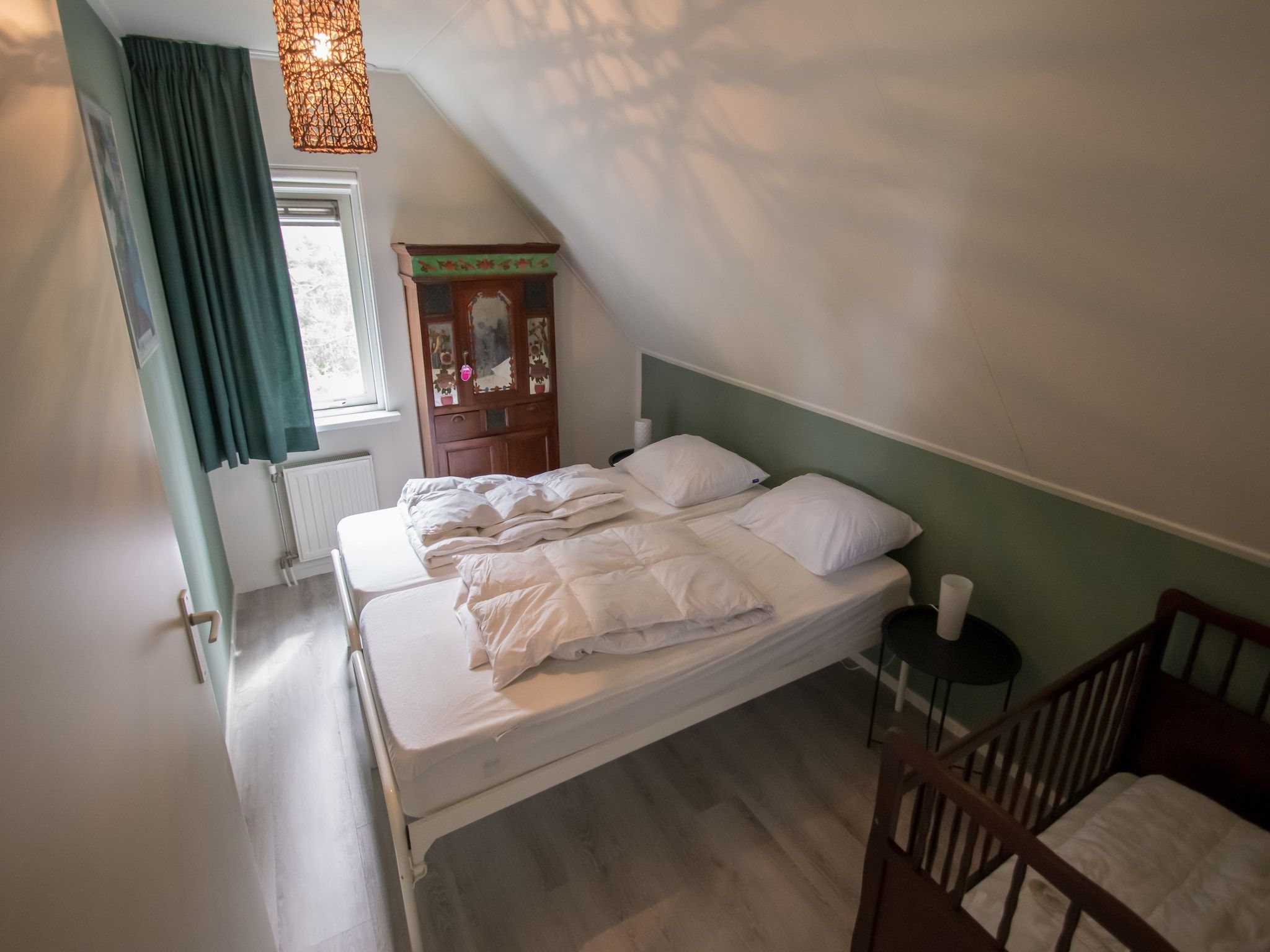 Een slaapkamer van Buitenplaats Berg en Bos nummer 13 in Overijssel