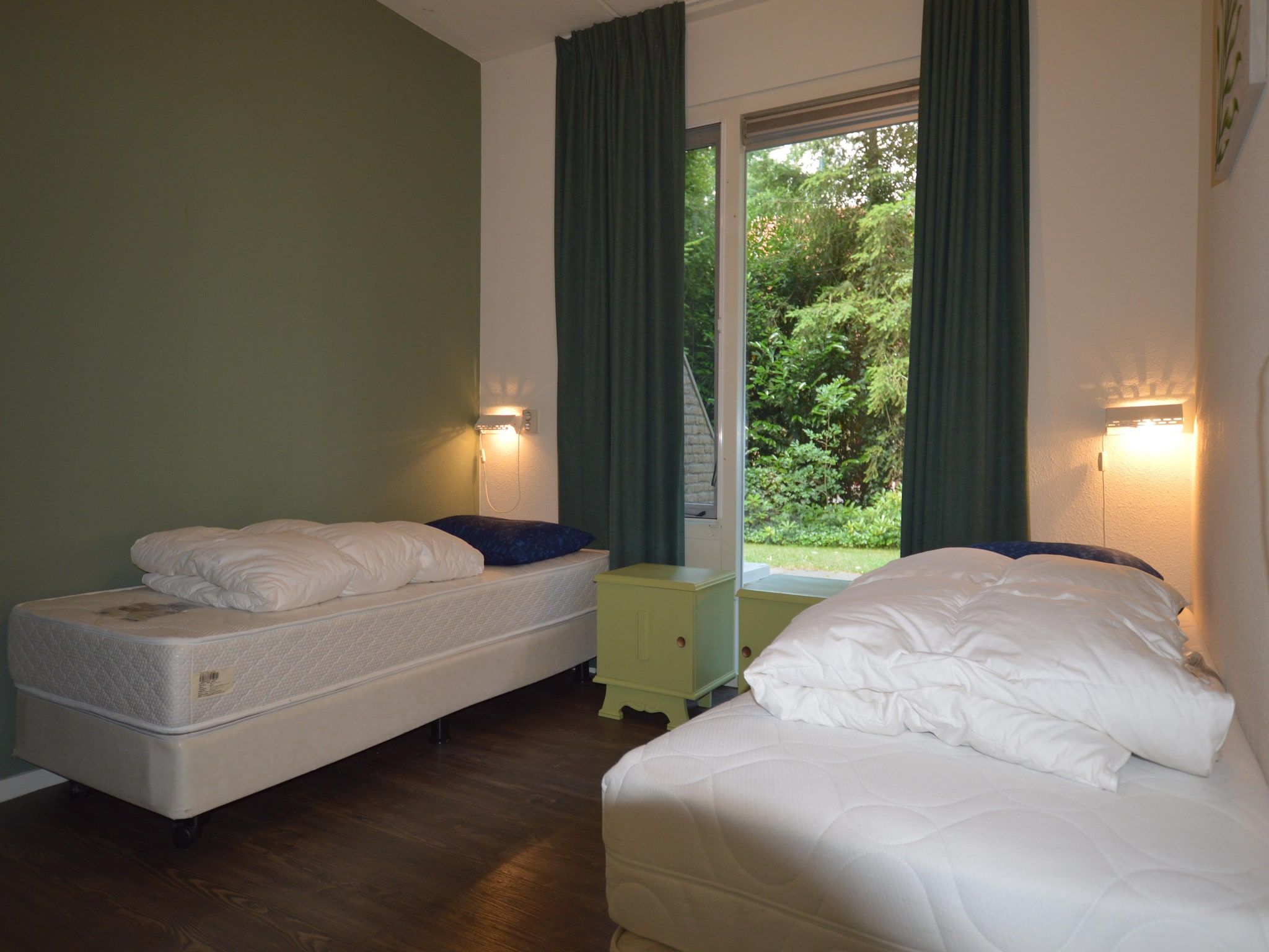 Een slaapkamer van Buitenplaats Berg en Bos nummer 13 in Overijssel