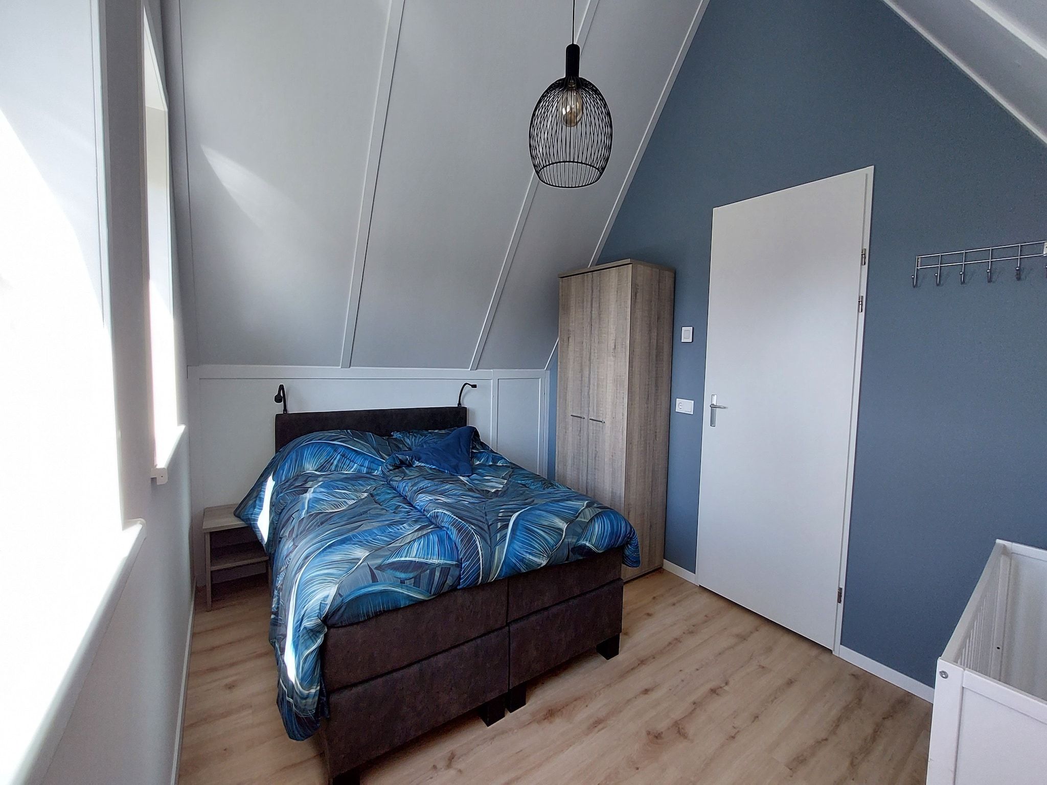 Een slaapkamer van De Meerkoet Huis Nr 37 in Scherpenisse