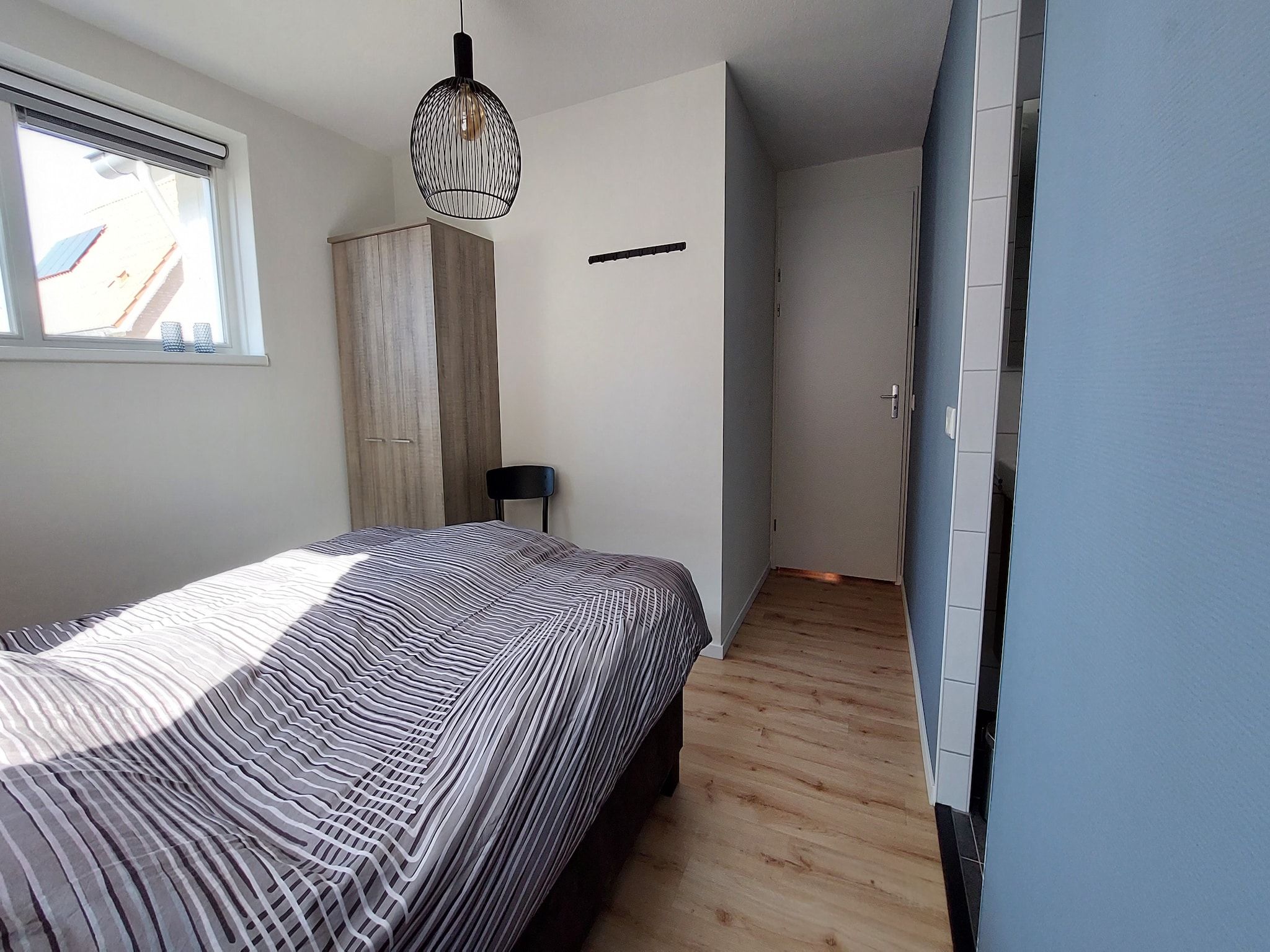 Een slaapkamer van De Meerkoet Huis Nr 37 in Scherpenisse