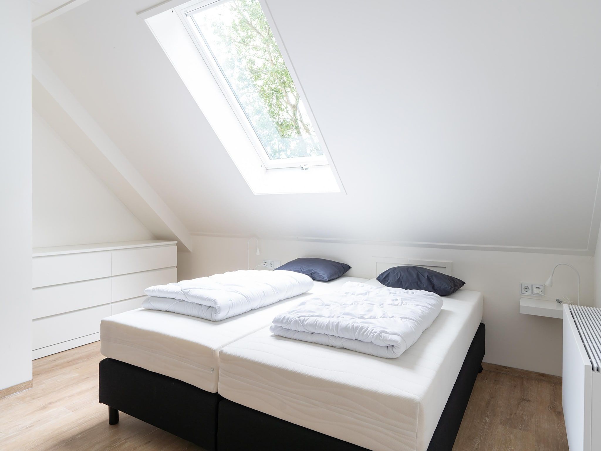 Een slaapkamer van Vrijersduin in Nes