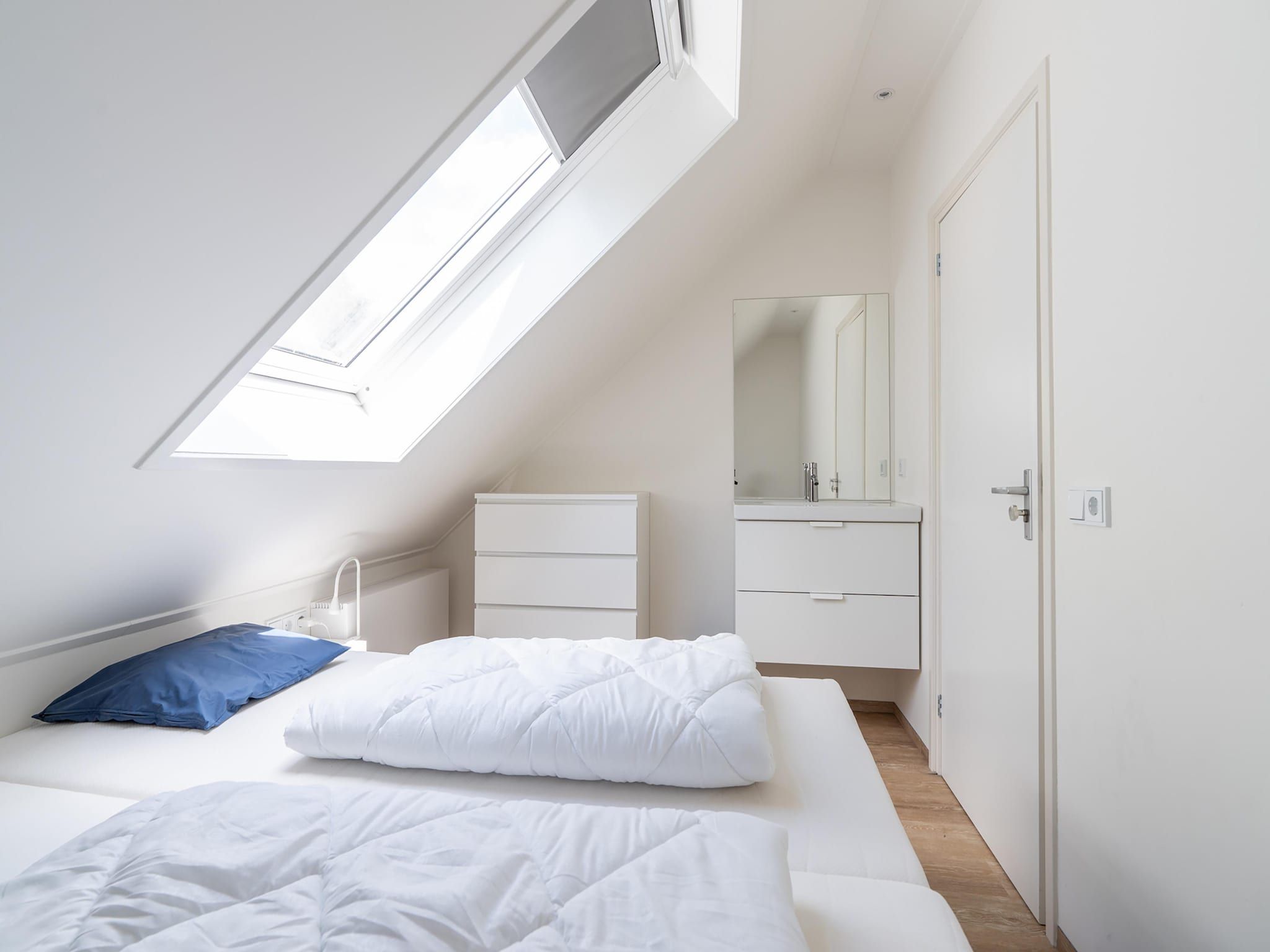 Een slaapkamer van Kaapsduin in Nes