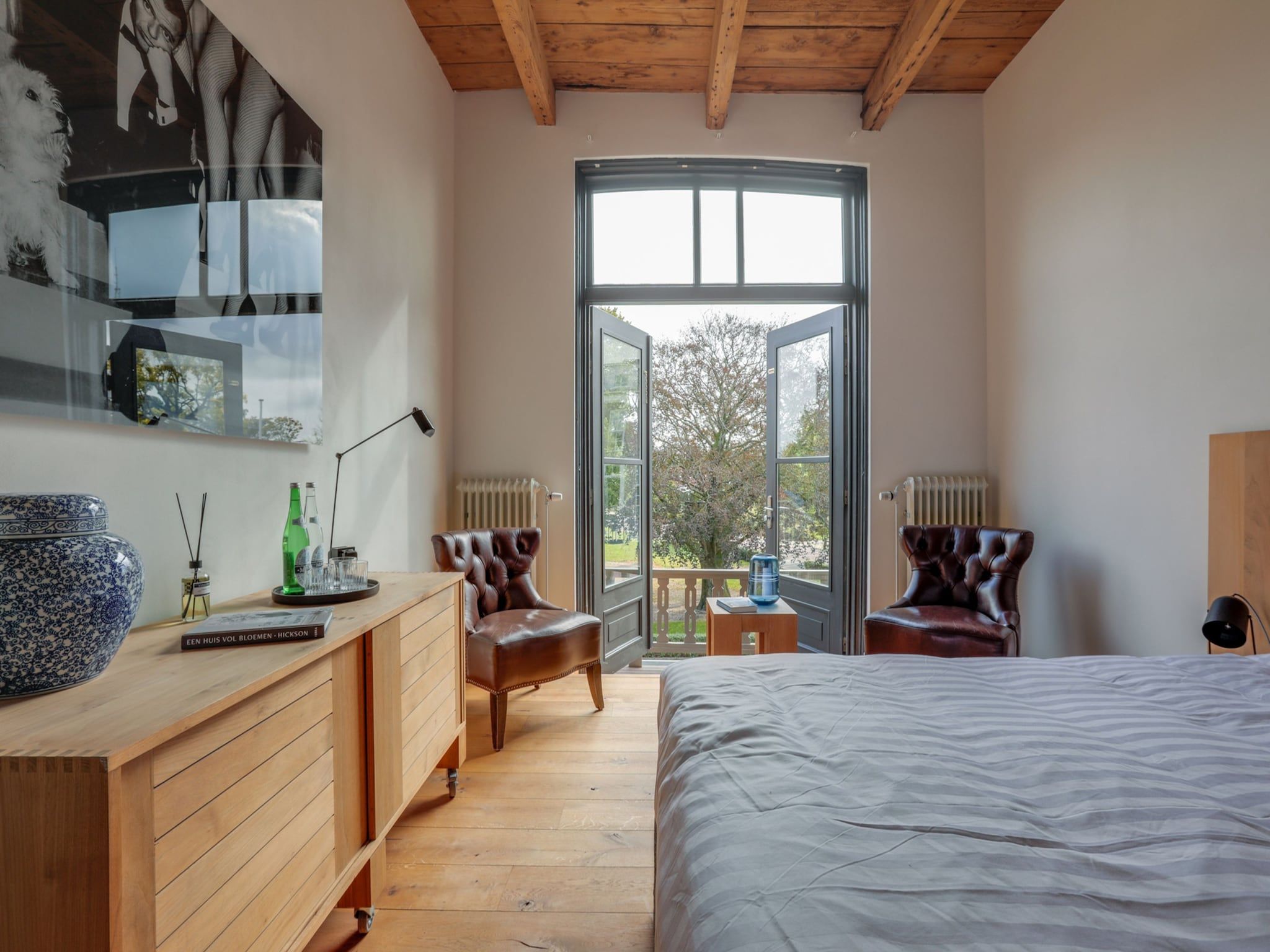 Een slaapkamer van 'Herberg De Waard van Ternaard' in Ternaard