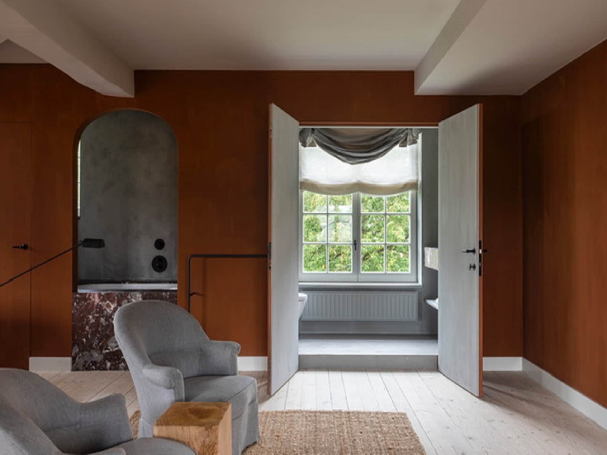 Een slaapkamer van Herenhoeve de Bockhof in Schimmert