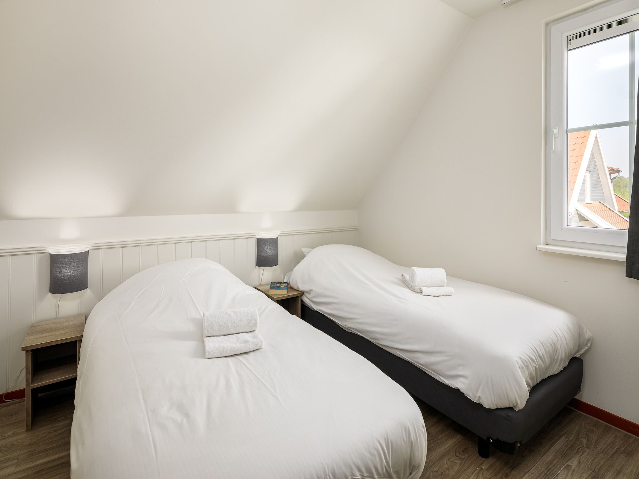 Een slaapkamer van Vakantiepark Klein Vink 9 in Arcen