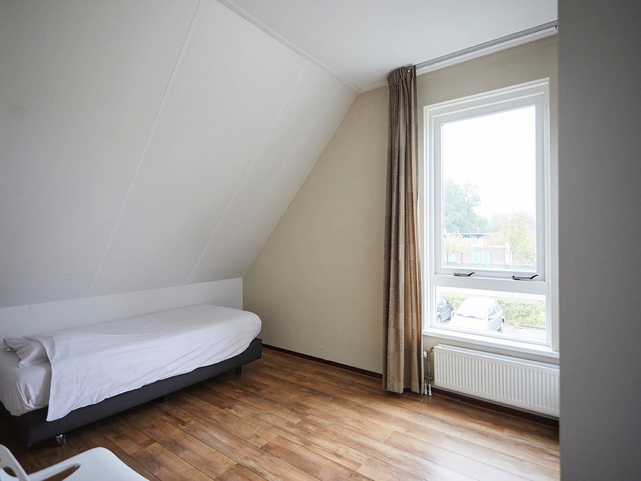 Een slaapkamer van Vakantiepark Hof van Zeeland  8 in Heinkenszand