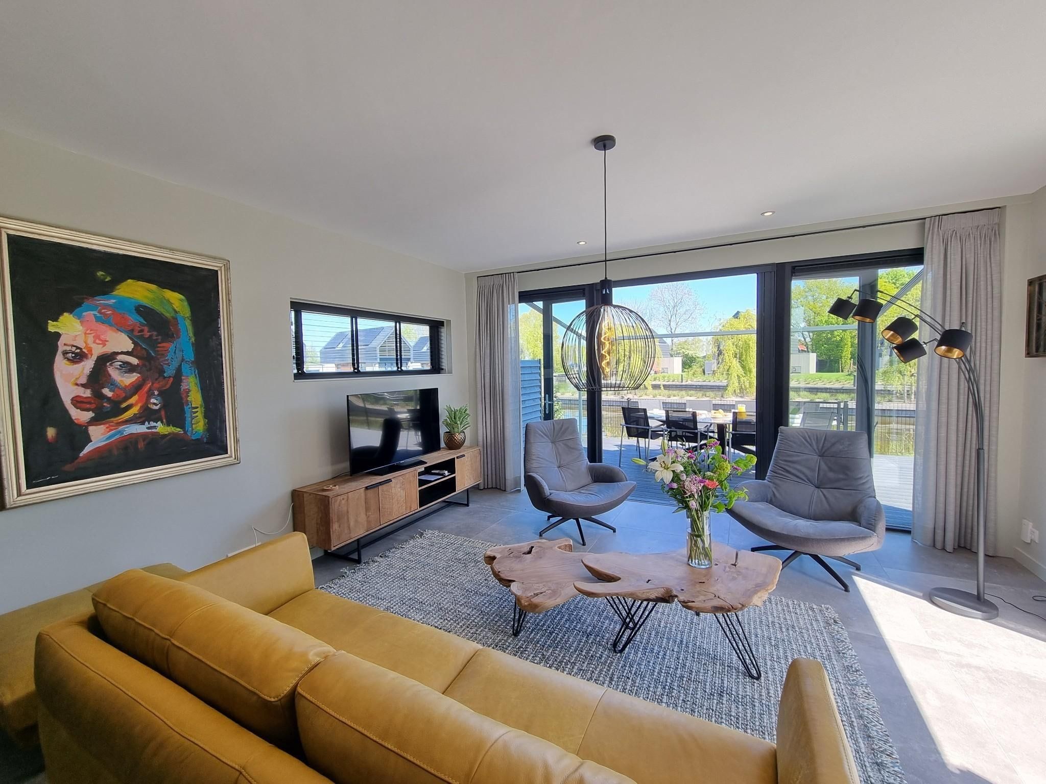 De woonkamer van Watervilla Trettjin in Balk