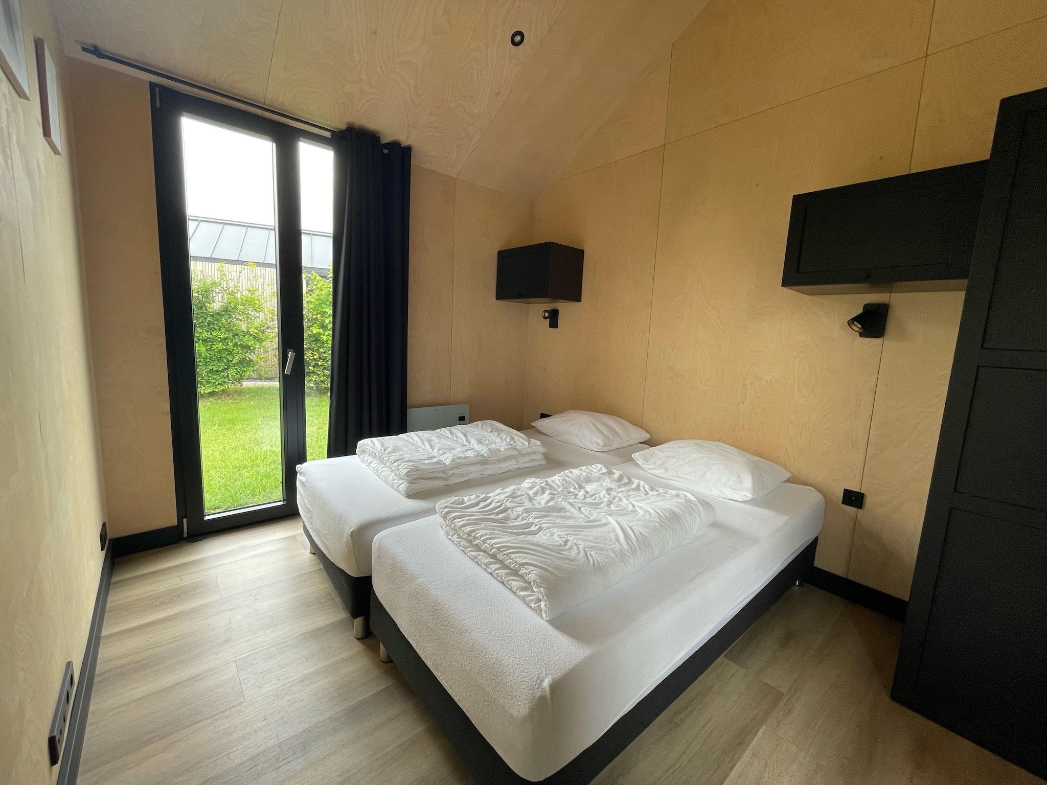 Een slaapkamer van Vakantiepark Eigen Wijze 12 in Bant