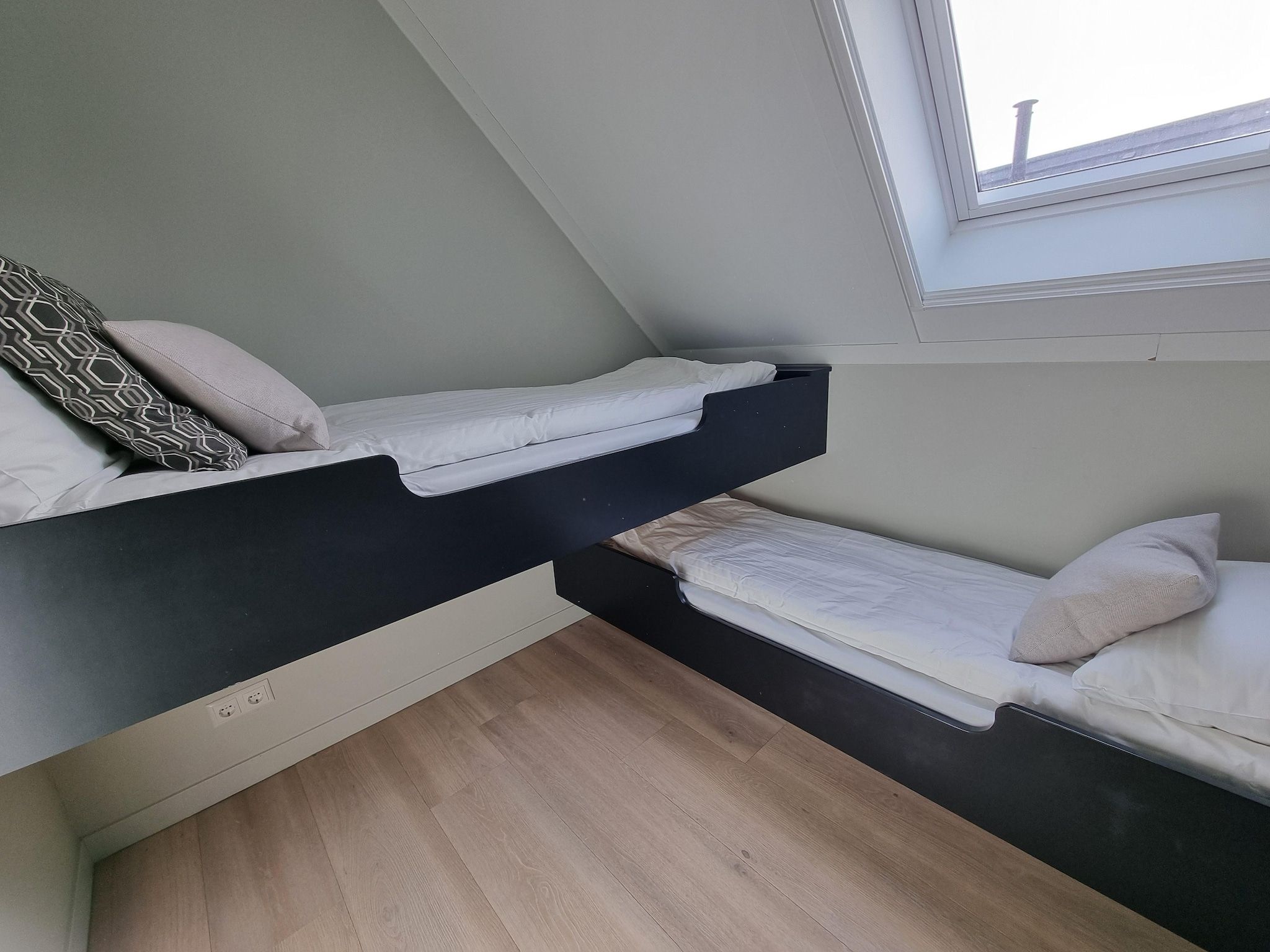 Een slaapkamer van Watervilla Fiiftjin in Balk