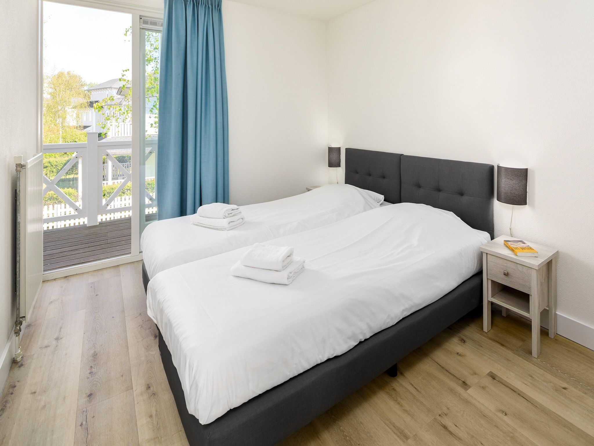 Een slaapkamer van Vakantiepark Cape Helius 24 in Hellevoetsluis