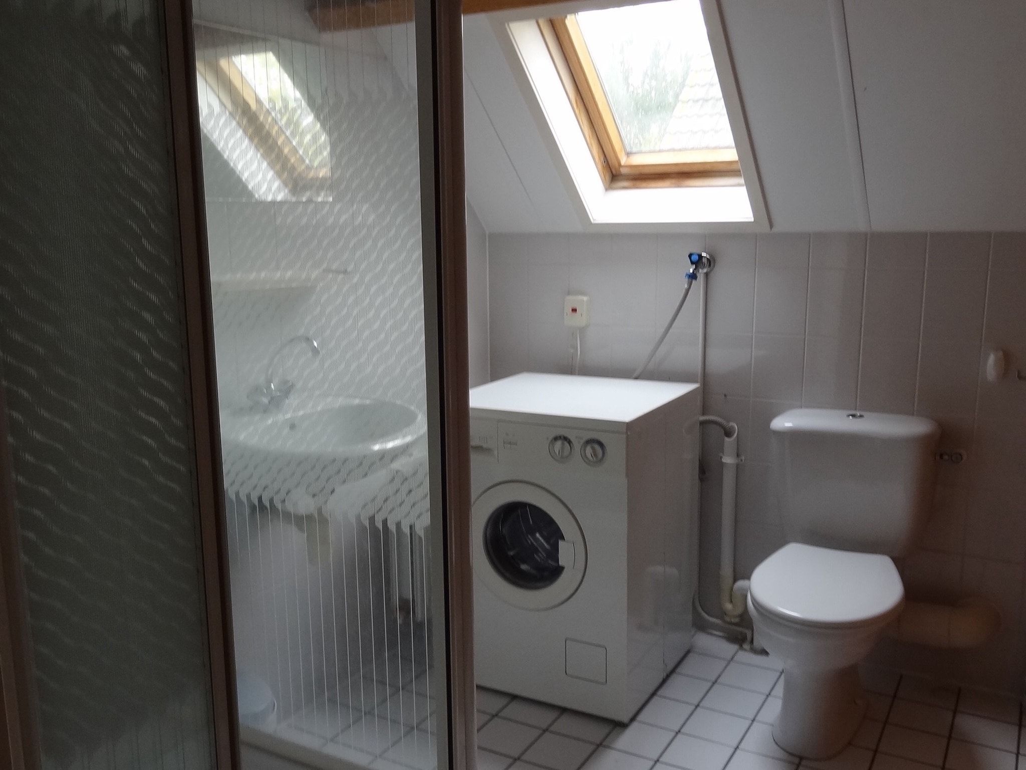 De badkamer van Villapark De Oesterbaai 15 in Wemeldinge