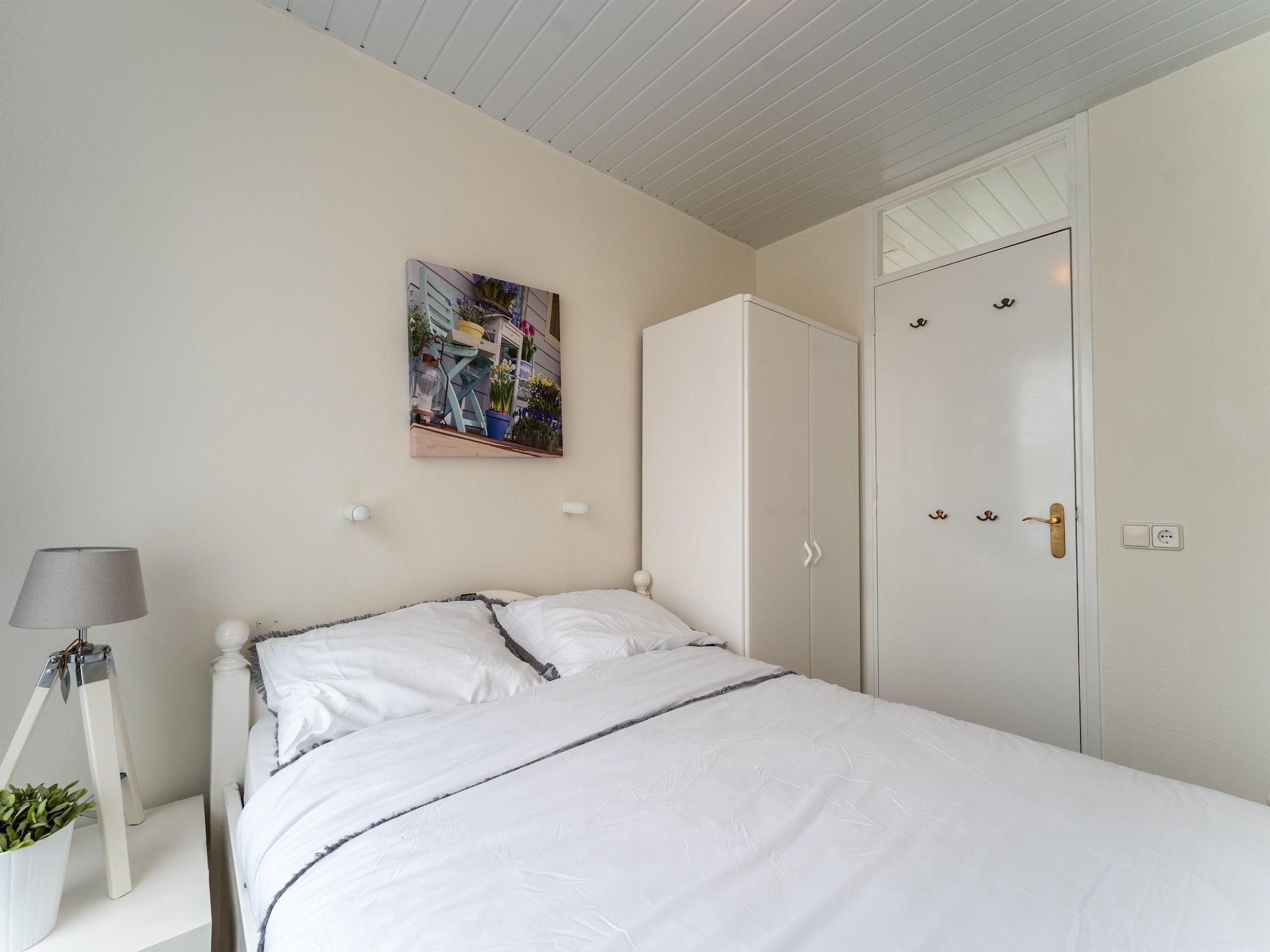 Een slaapkamer van Scheldeoord 70 in Baarland