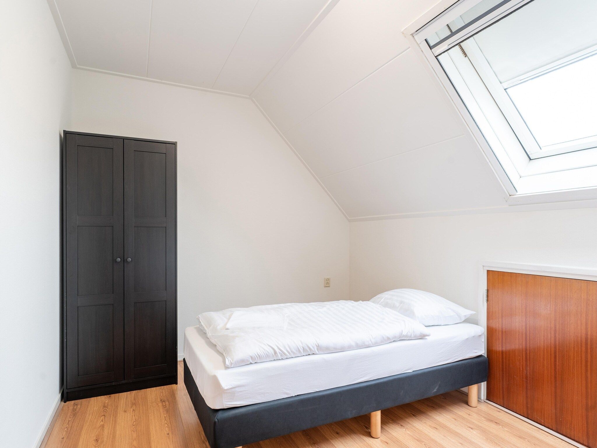 Een slaapkamer van Genieten in Silvolde II in Silvolde