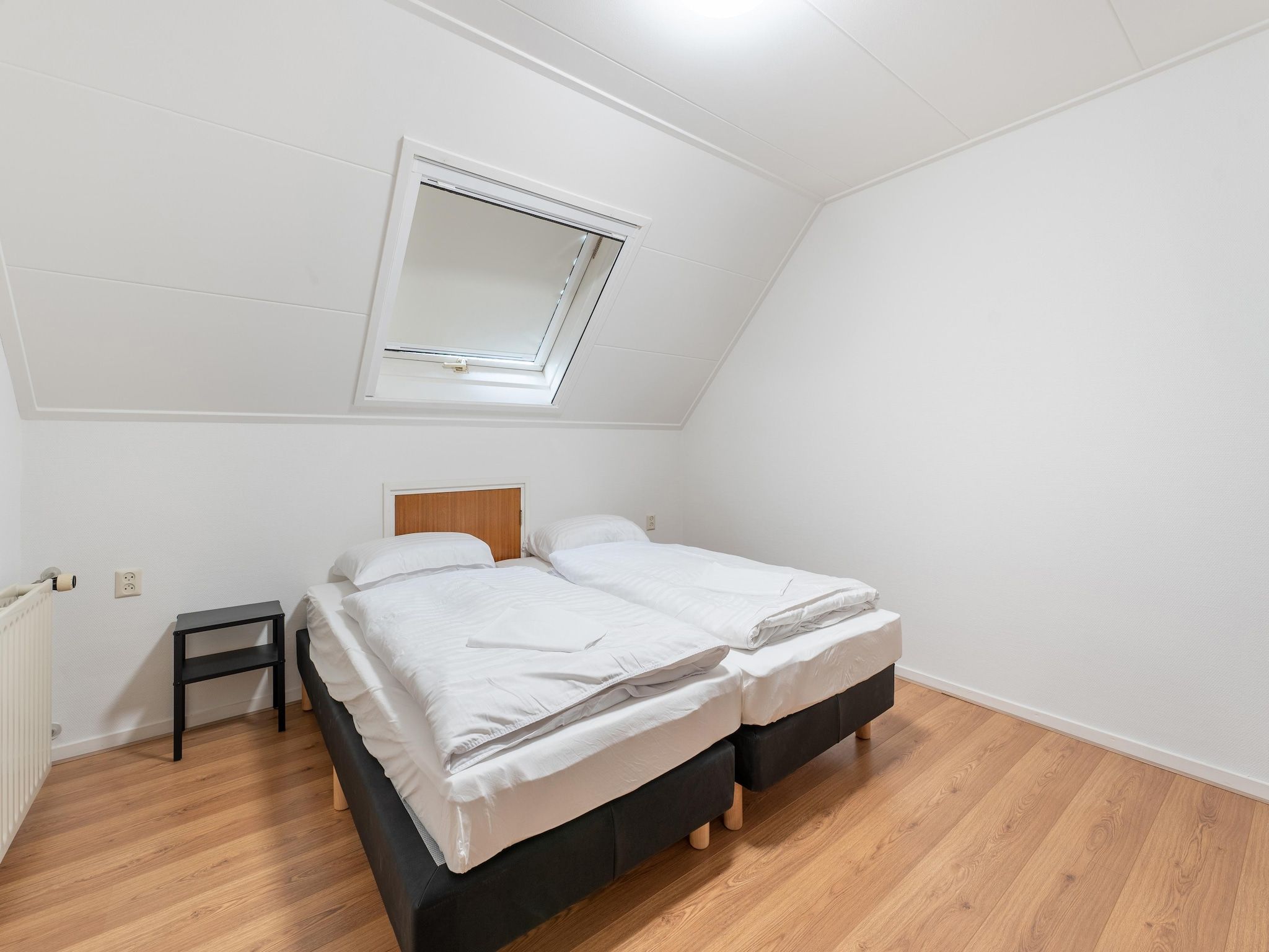 Een slaapkamer van Genieten in Silvolde II in Silvolde