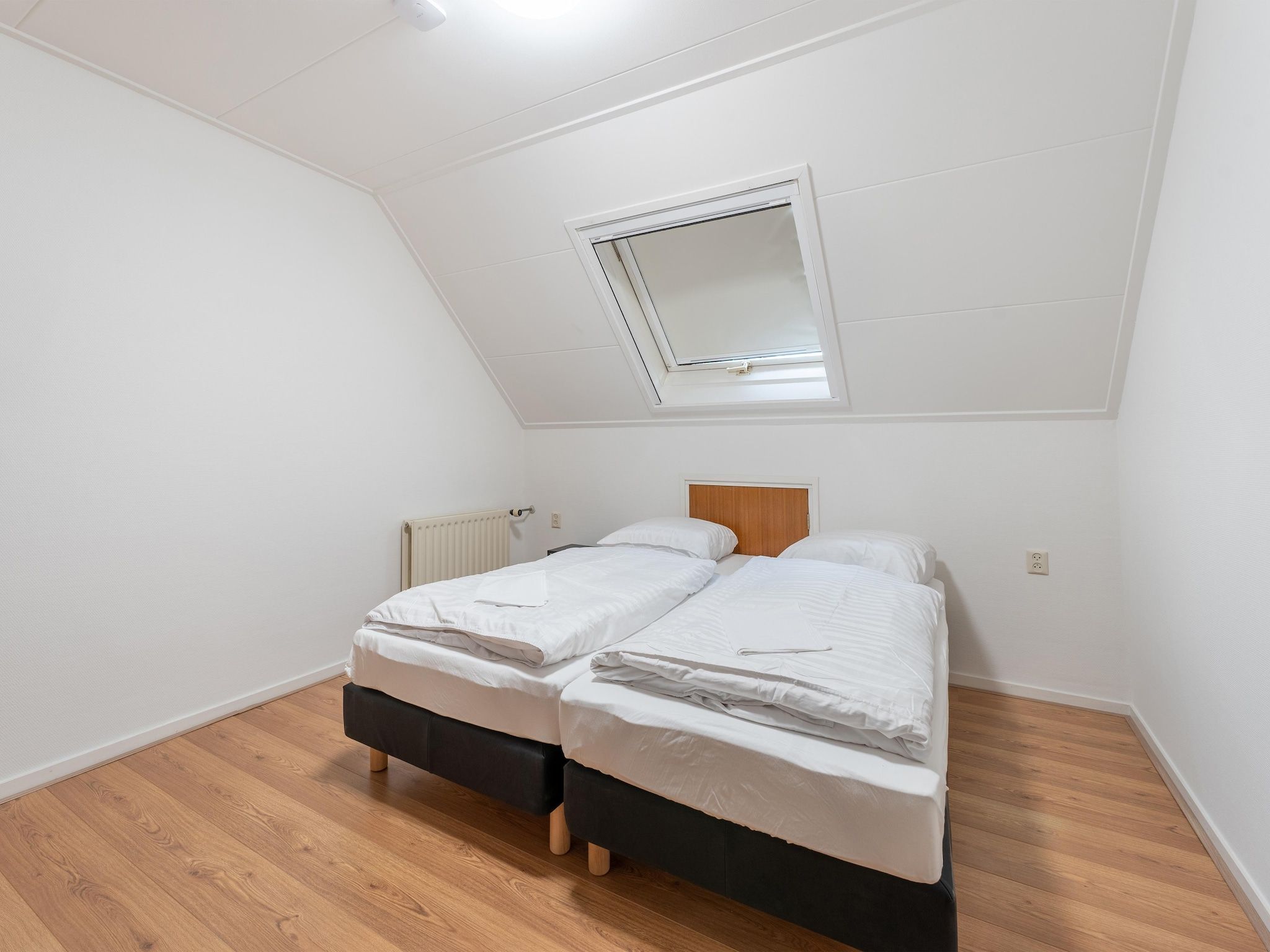 Een slaapkamer van Genieten in Silvolde II in Silvolde