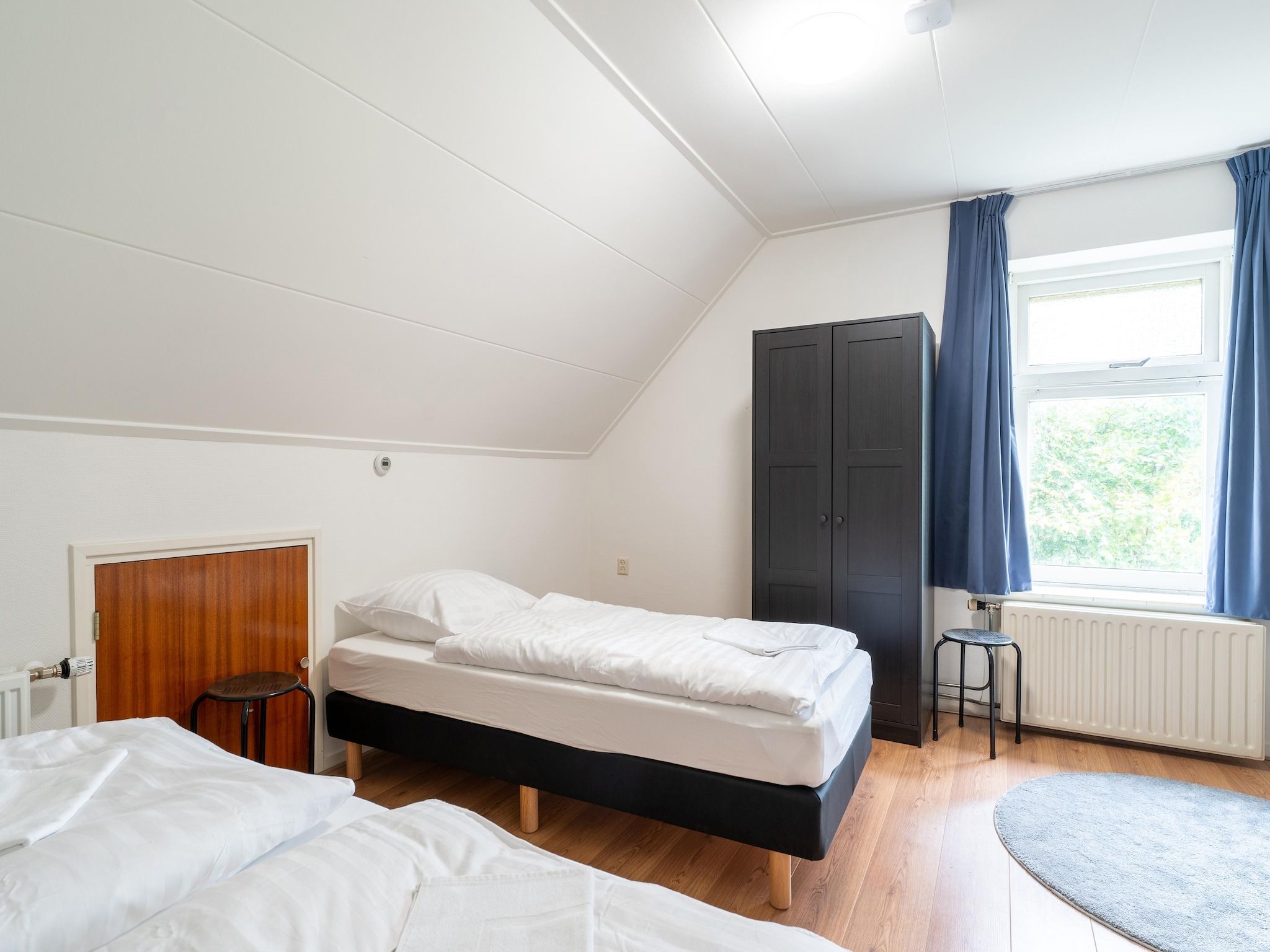 Een slaapkamer van Genieten in Silvolde II in Silvolde