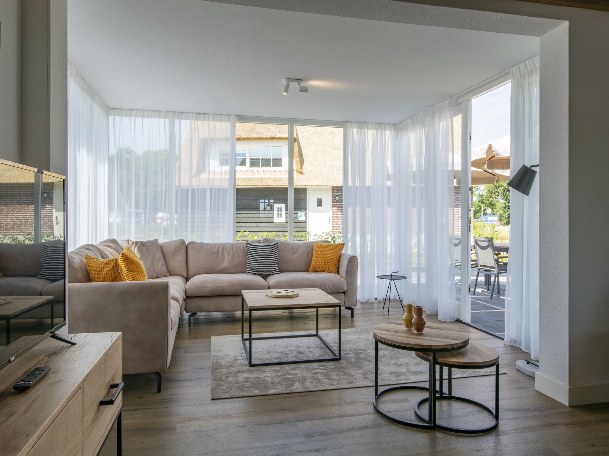 De woonkamer van Vakantiepark De Heihorsten 10 in Someren