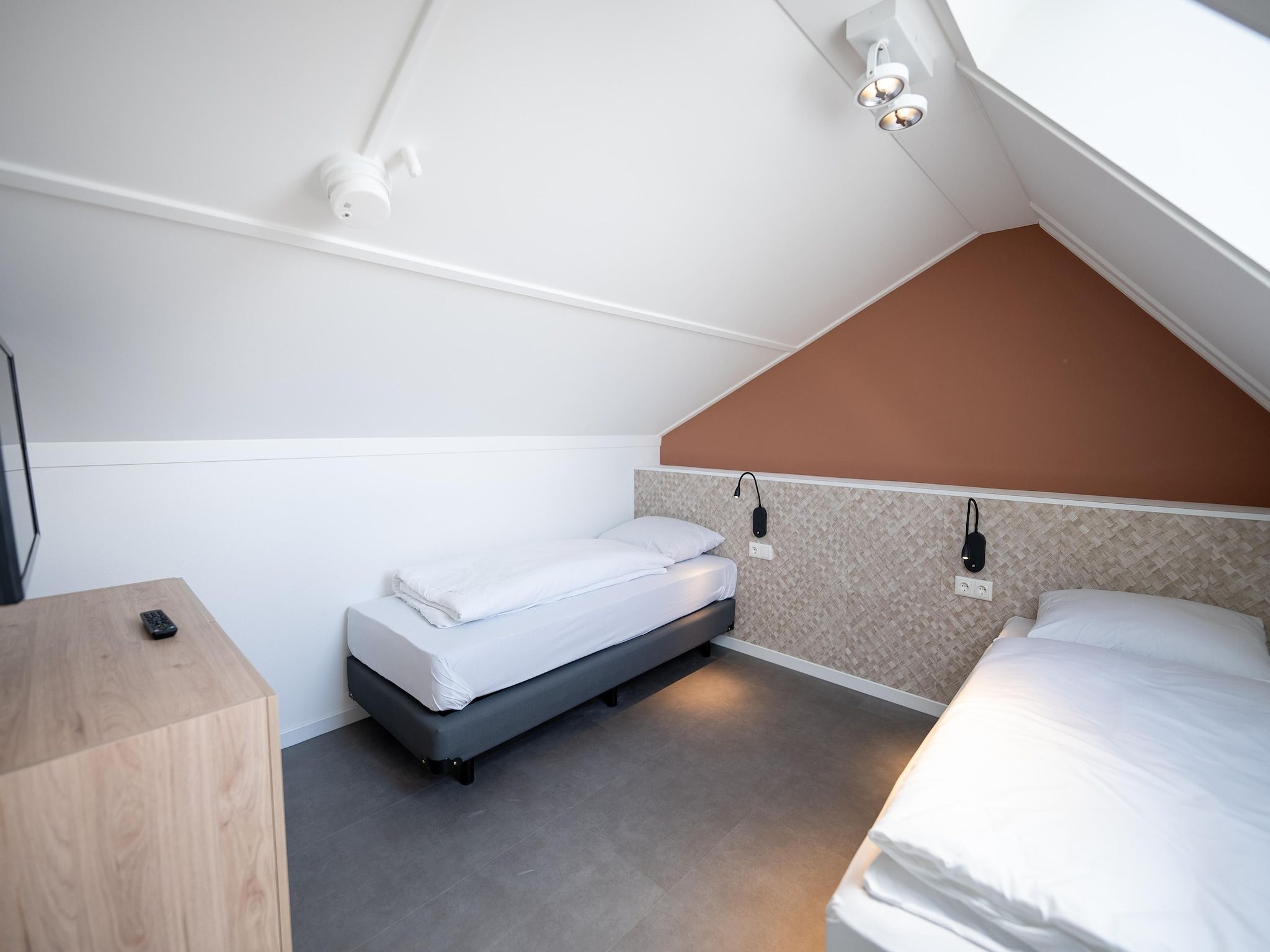 Een slaapkamer van Vakantiepark Zeebad 19 in Breskens