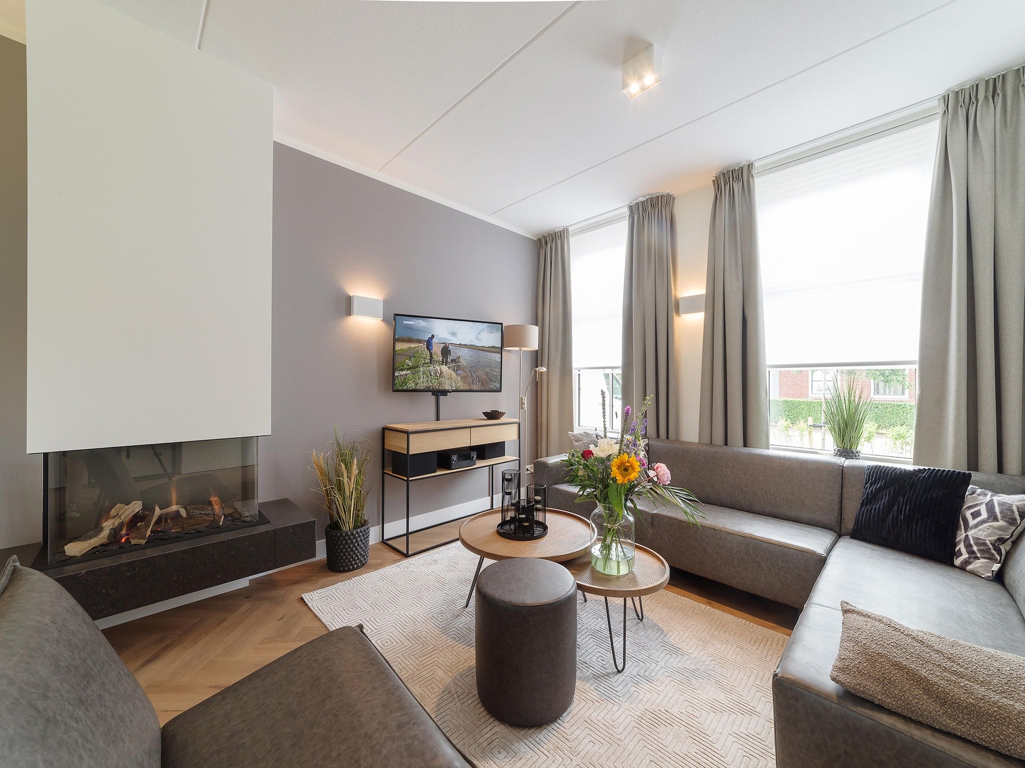 De woonkamer van Zeeuwse Pracht 8 p welness in Colijnsplaat