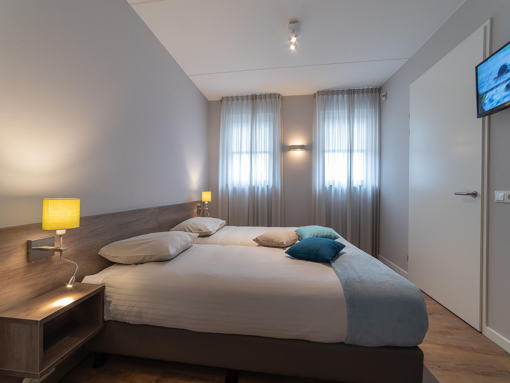 Een slaapkamer van Zeeuwse Pracht 8 p welness in Colijnsplaat