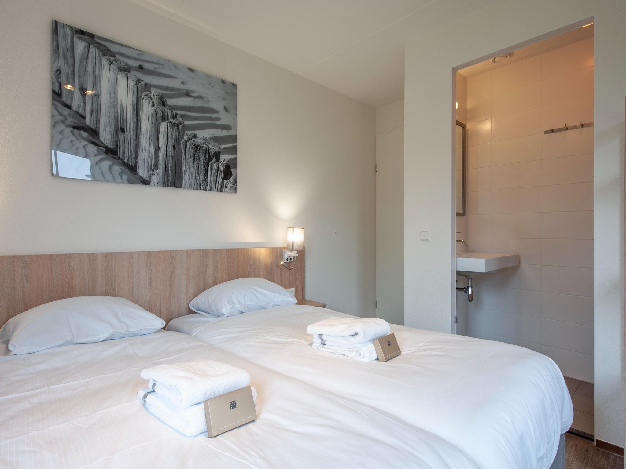 Een slaapkamer van Noordzee Résidence Cadzand-Bad 20 in Cadzand-Bad