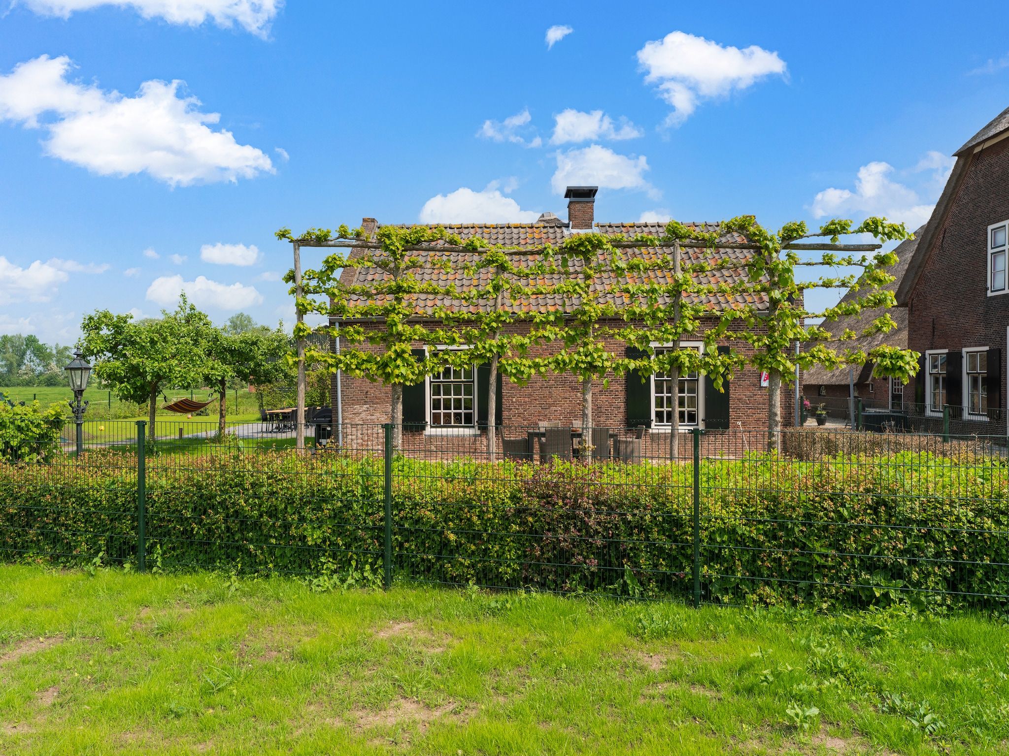 De tuin van The Old Farmhouse in Montfoort
