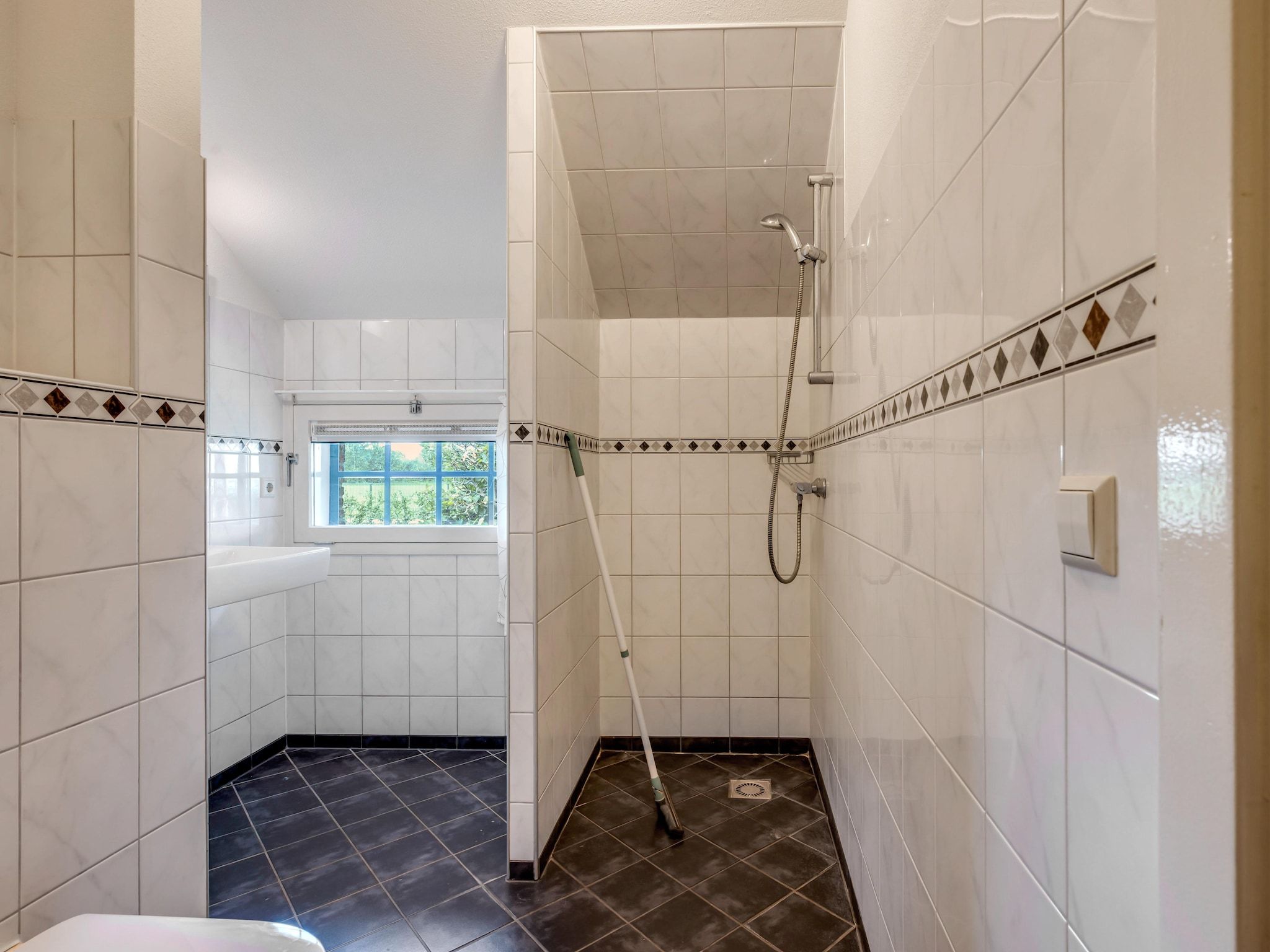 De badkamer van The Old Farmhouse in Montfoort