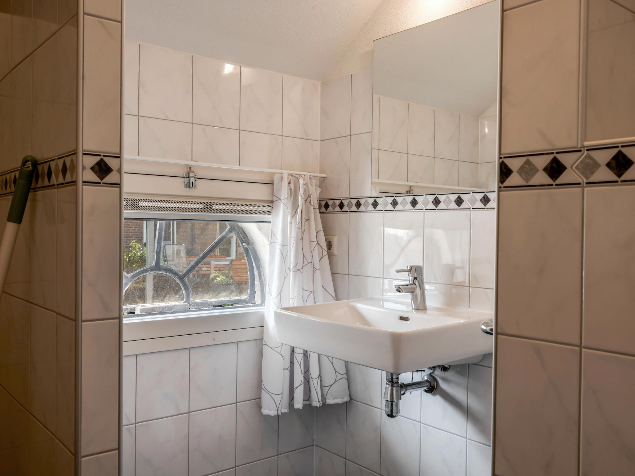 De badkamer van The Old Farmhouse in Montfoort