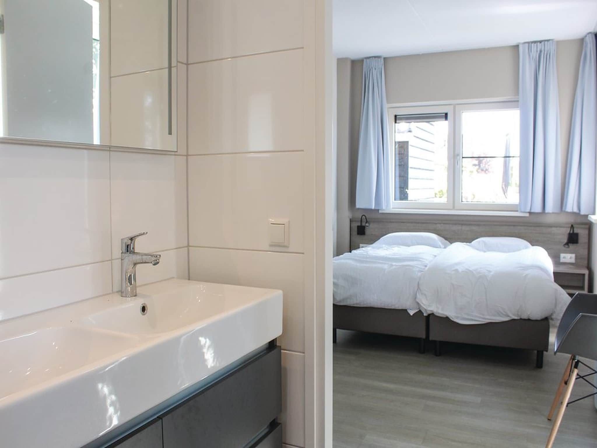 Een slaapkamer van Recreatiepark Idskenhuizen 5 in Idskenhuizen