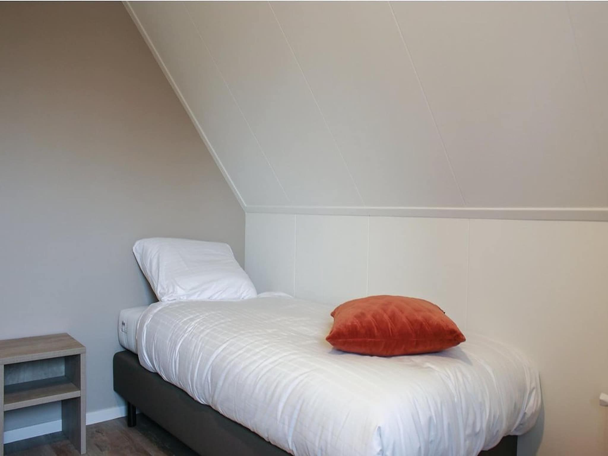 Een slaapkamer van Recreatiepark Idskenhuizen 6 in Idskenhuizen