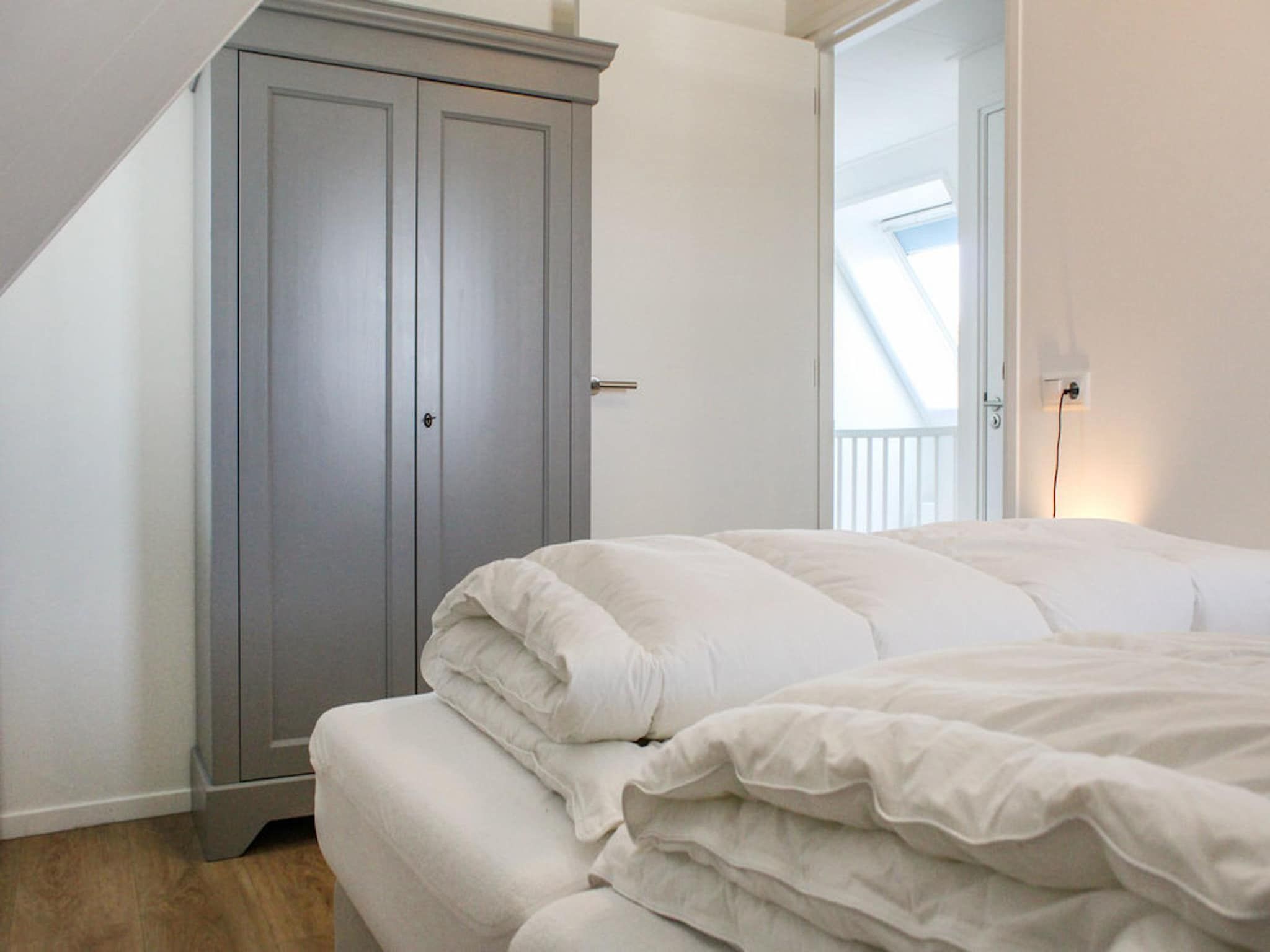 Een slaapkamer van Recreatiepark Idskenhuizen 8 in Idskenhuizen