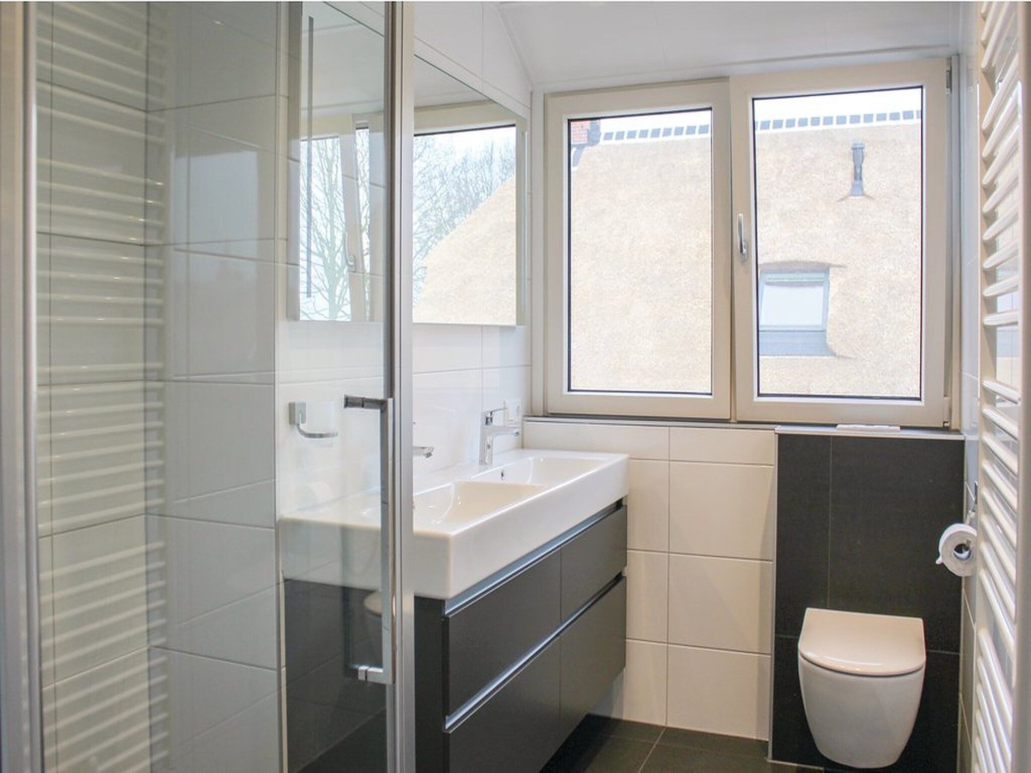 De badkamer van Recreatiepark Idskenhuizen 10 in Idskenhuizen