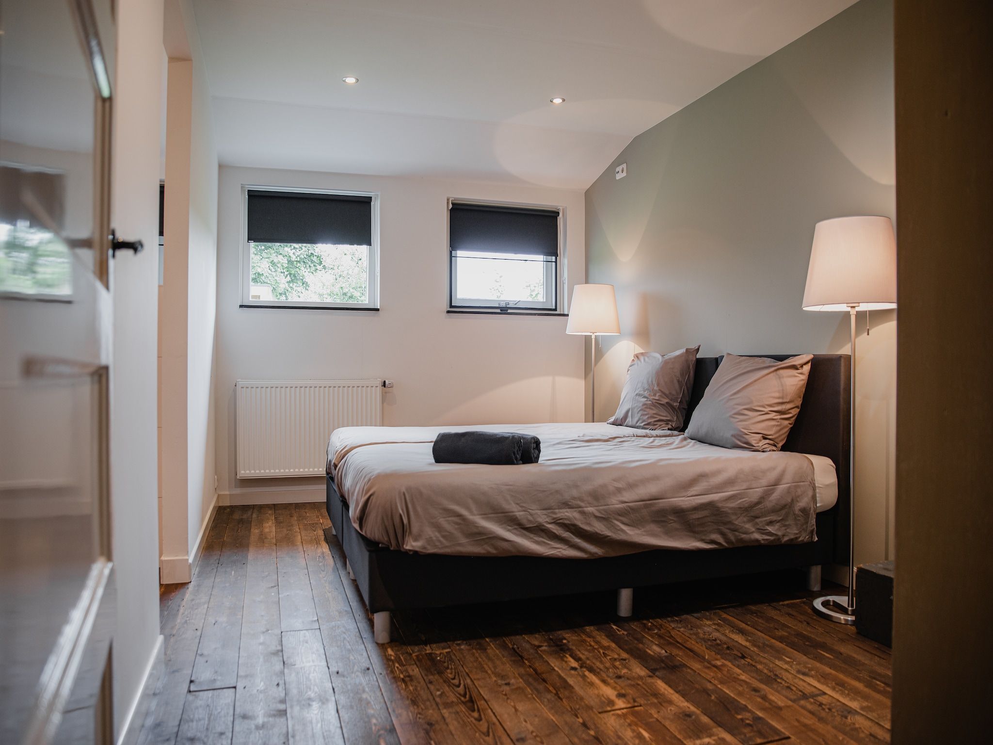 Een slaapkamer van Dorpswoning De Volbloed in Leende