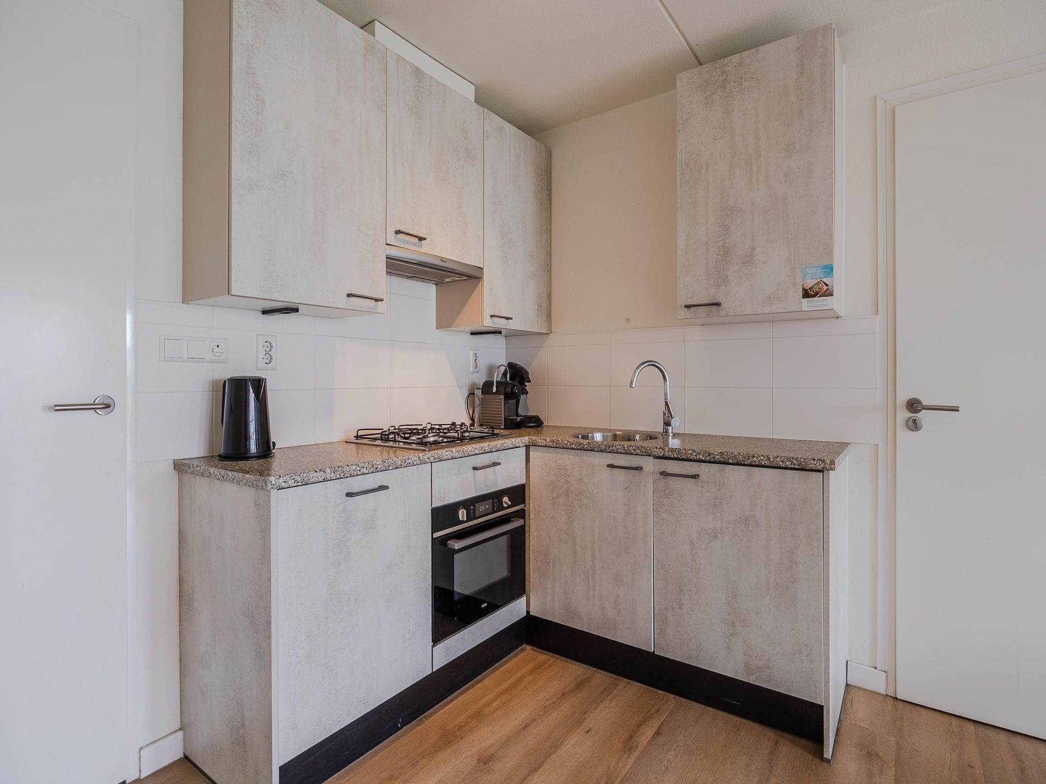 De keuken van Noordzee Residence Cadzand-Bad 25 in Cadzand-Bad