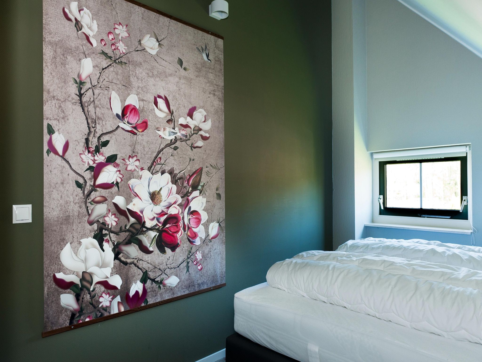 Een slaapkamer van 12 pers Lethehuis met sauna buitenspa en toerboot in Vlagtwedde