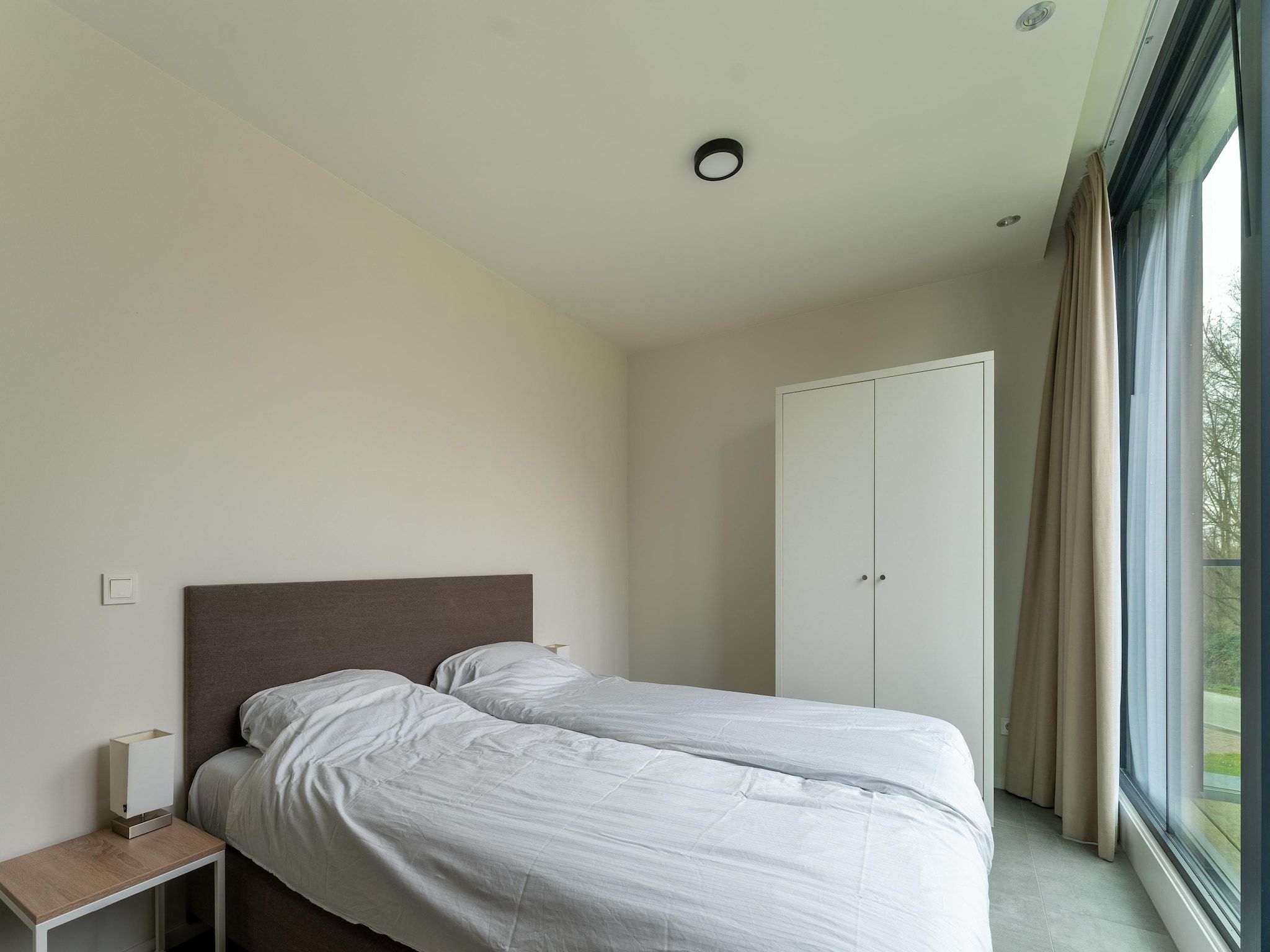 Een slaapkamer van Harbour Village 15 in Arnemuiden