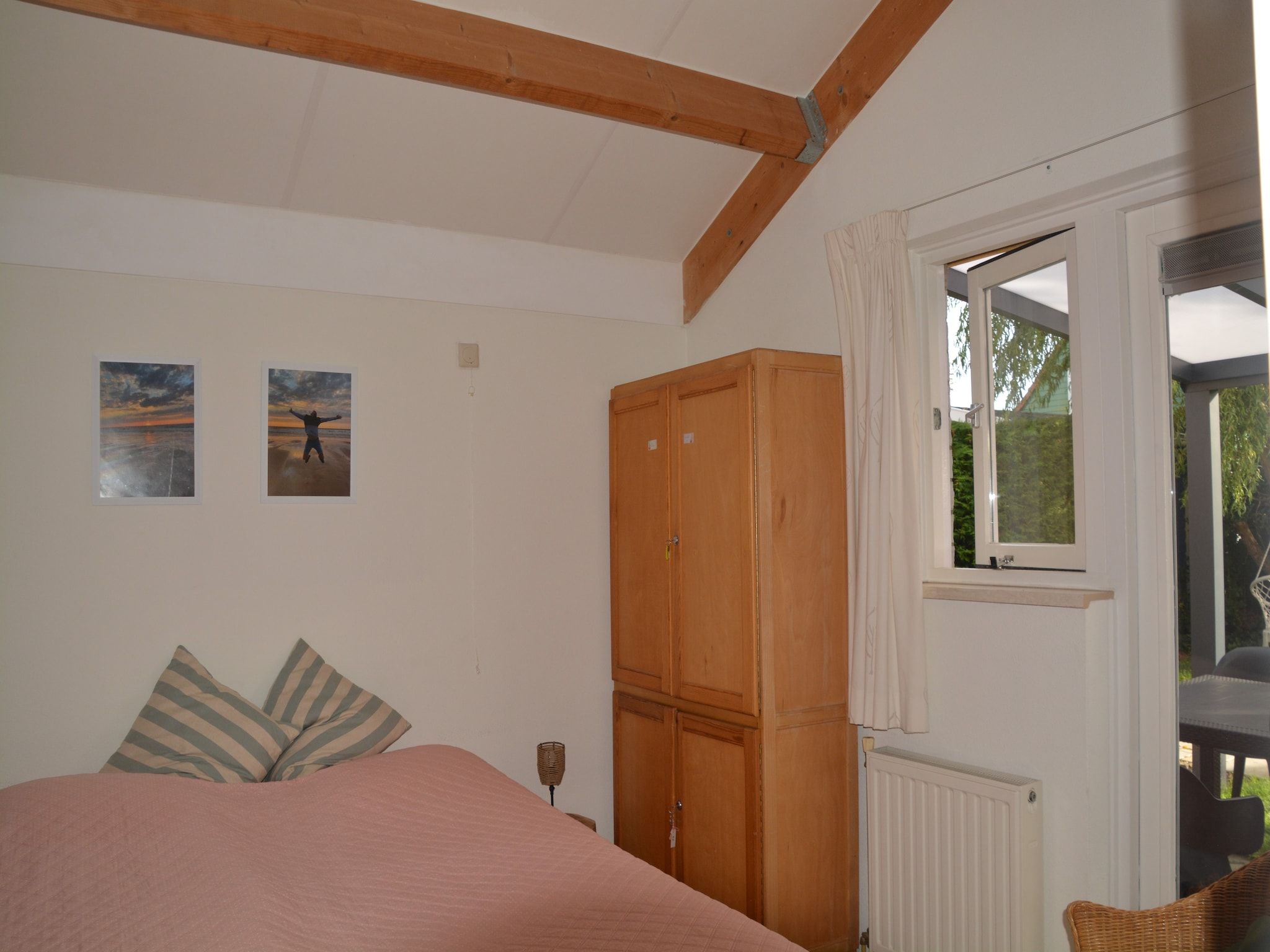 Een slaapkamer van Villapark De Oesterbaai 110 in Wemeldinge