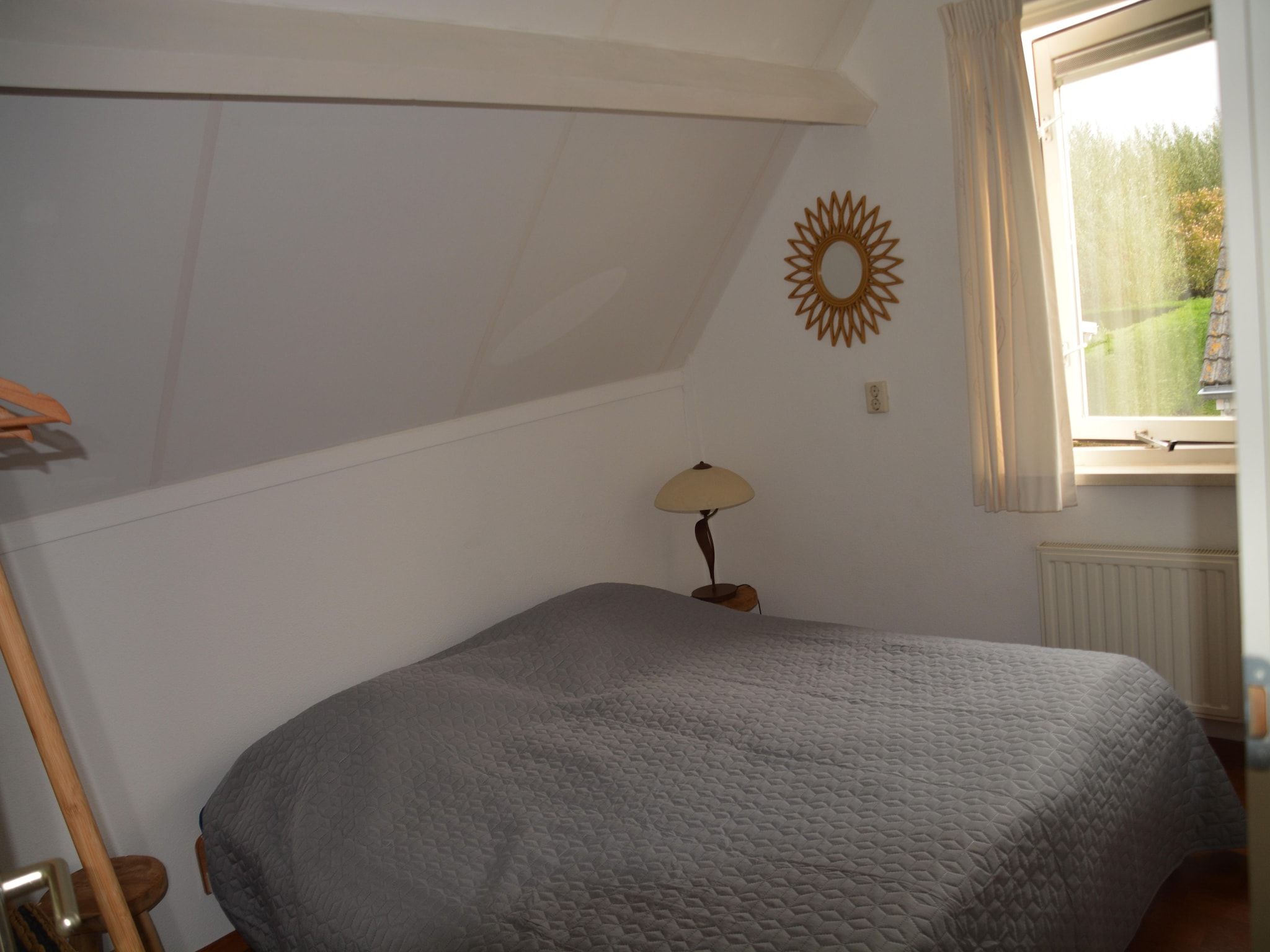 Een slaapkamer van Villapark De Oesterbaai 110 in Wemeldinge