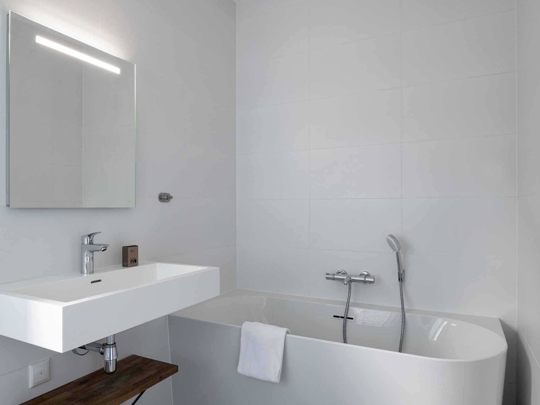 De badkamer van Resort Nieuwvliet-Bad 9 in Nieuwvliet