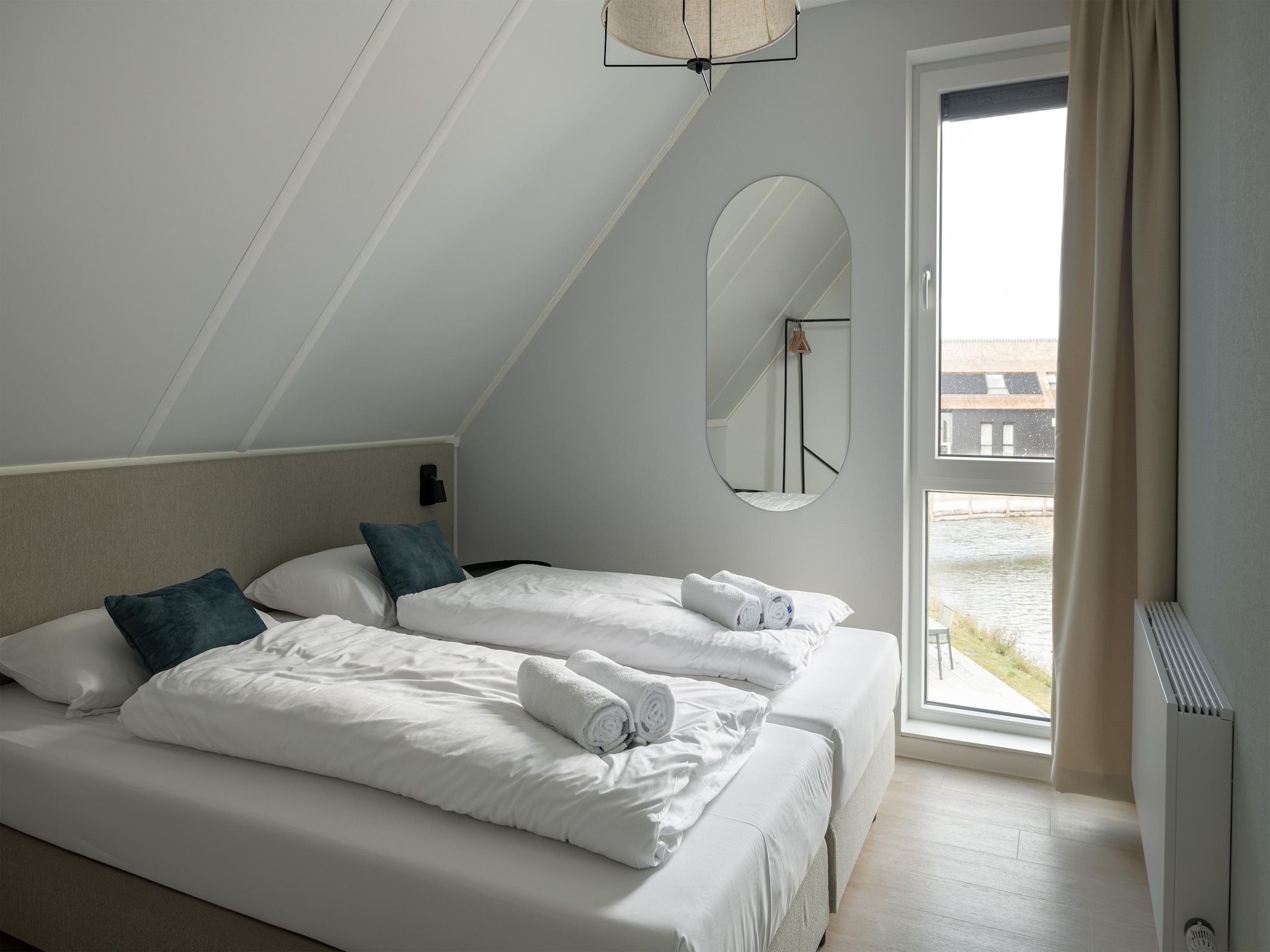 Een slaapkamer van Resort Nieuwvliet-Bad 9 in Nieuwvliet