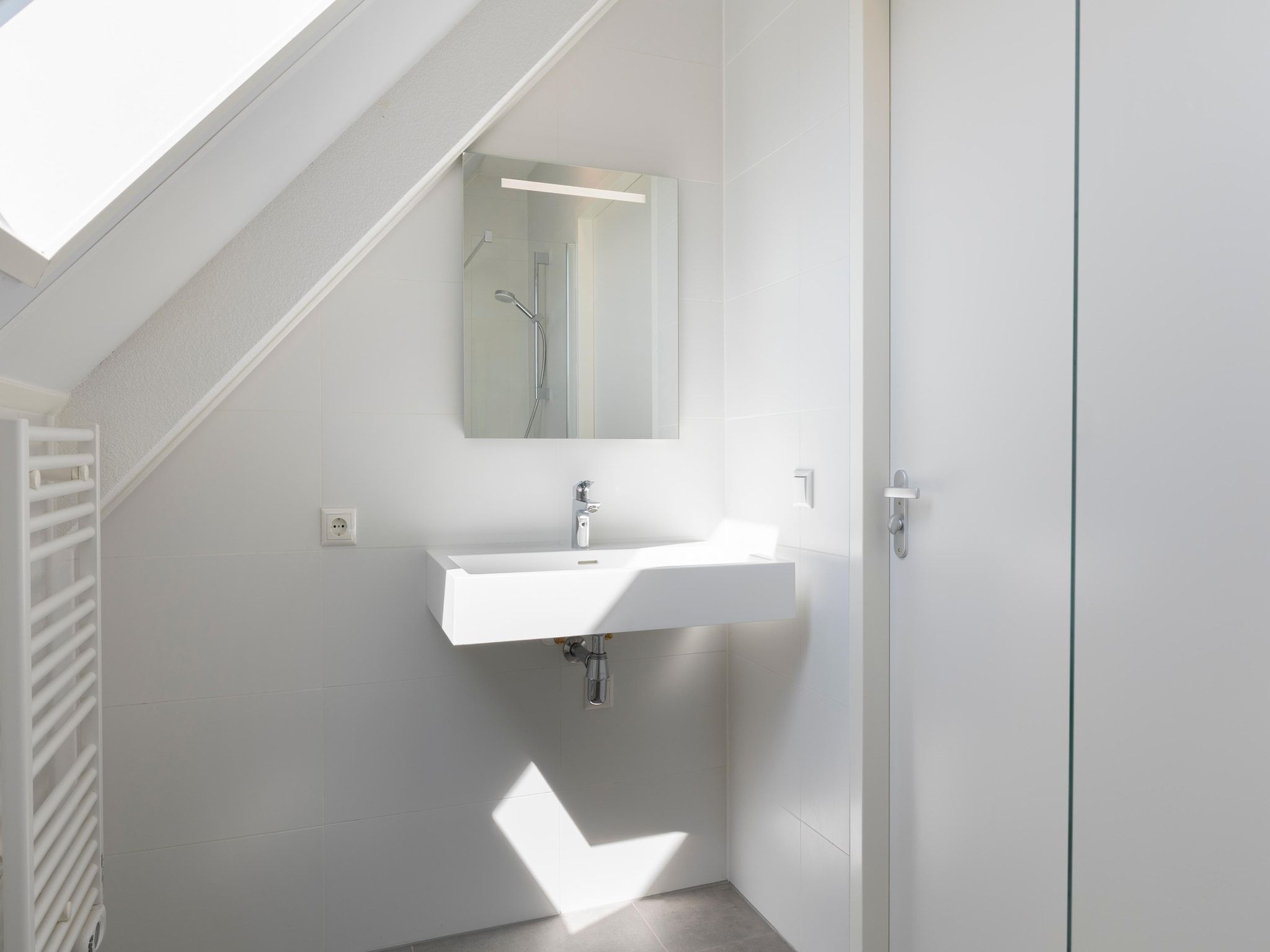 De badkamer van Resort Nieuwvliet-Bad 12 in Nieuwvliet