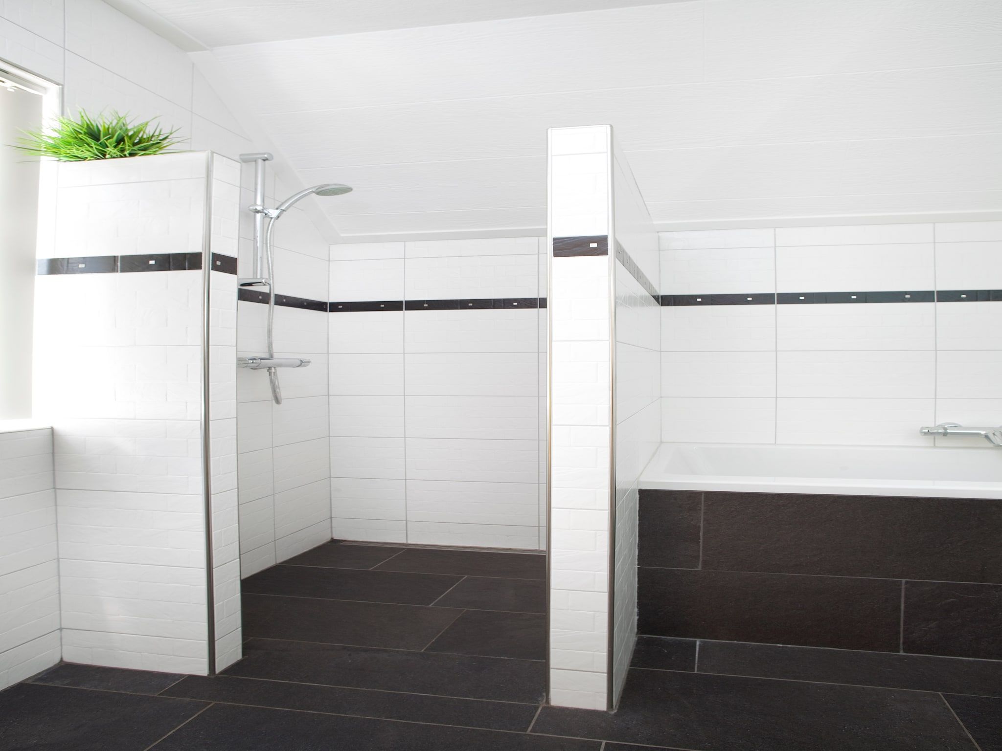 De badkamer van De Familieboerderij in Losser