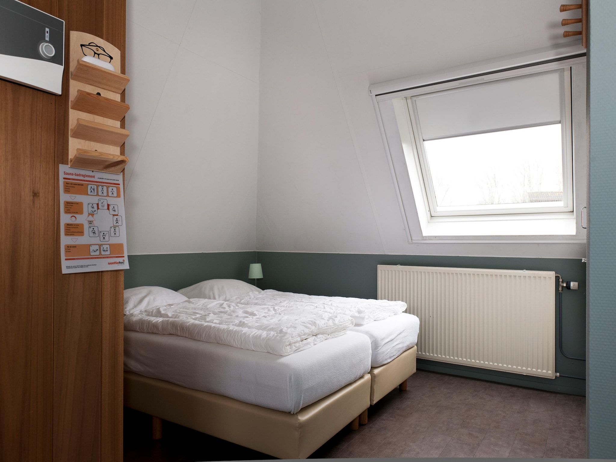 Een slaapkamer van Wiid Wellness de luxe met sauna & buitenspa in Friesland