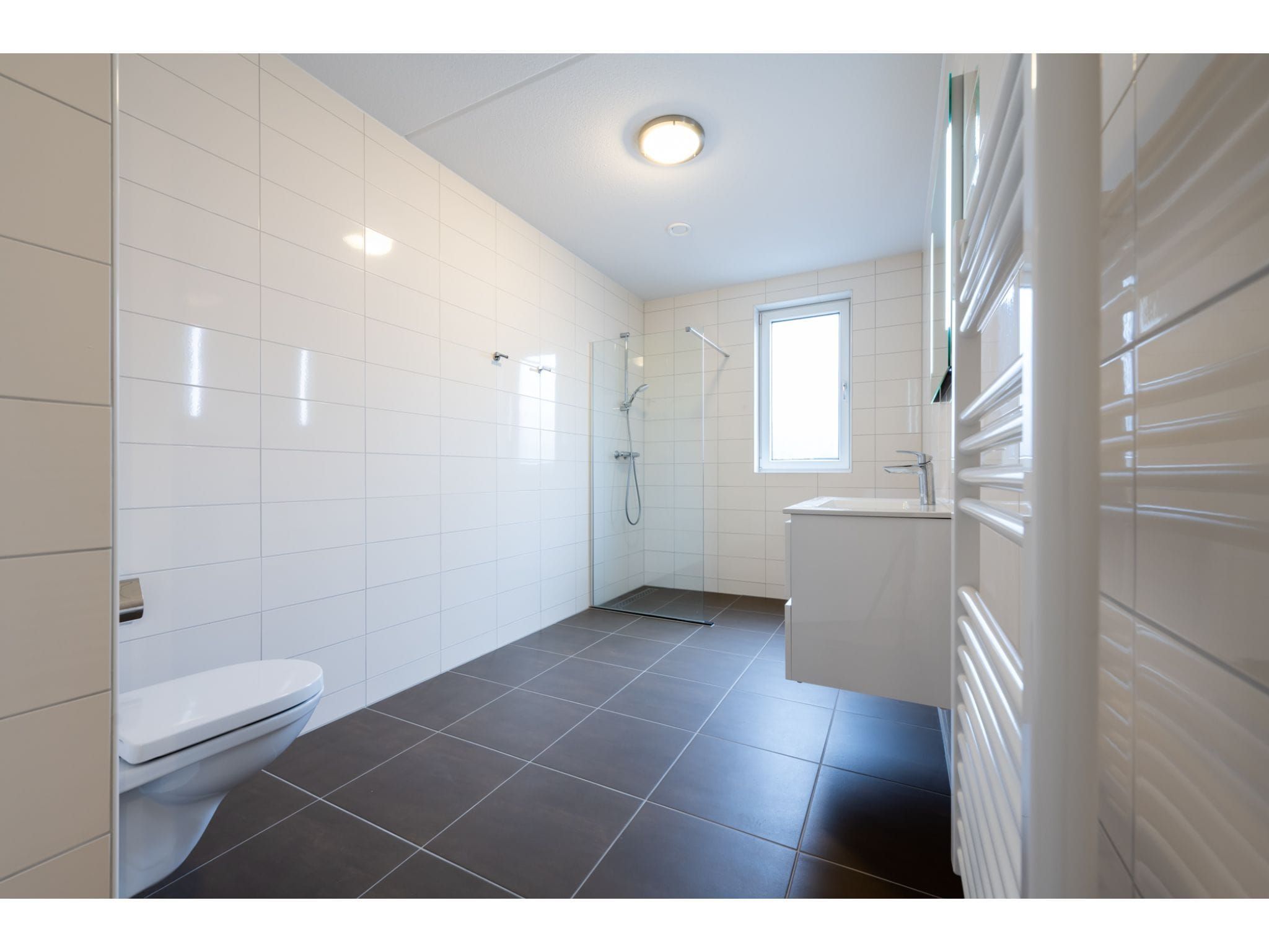 De badkamer van Harbour Loft 1 / Residence Marina 8 pers in Kamperland